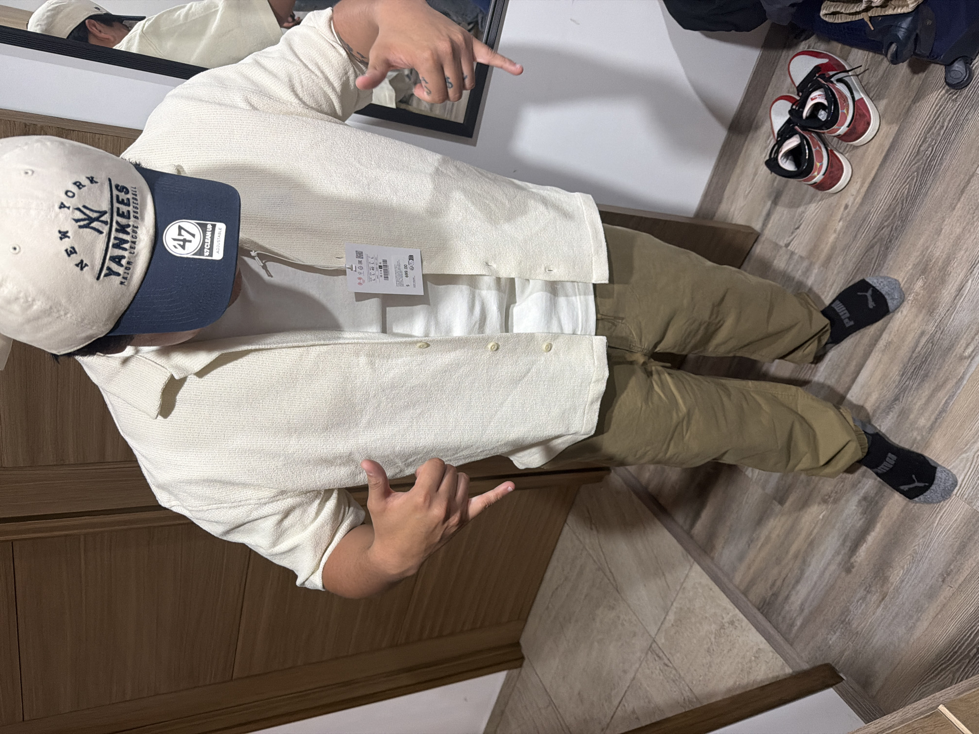 Person in casual wear observed indoors in San Andrés Cholula