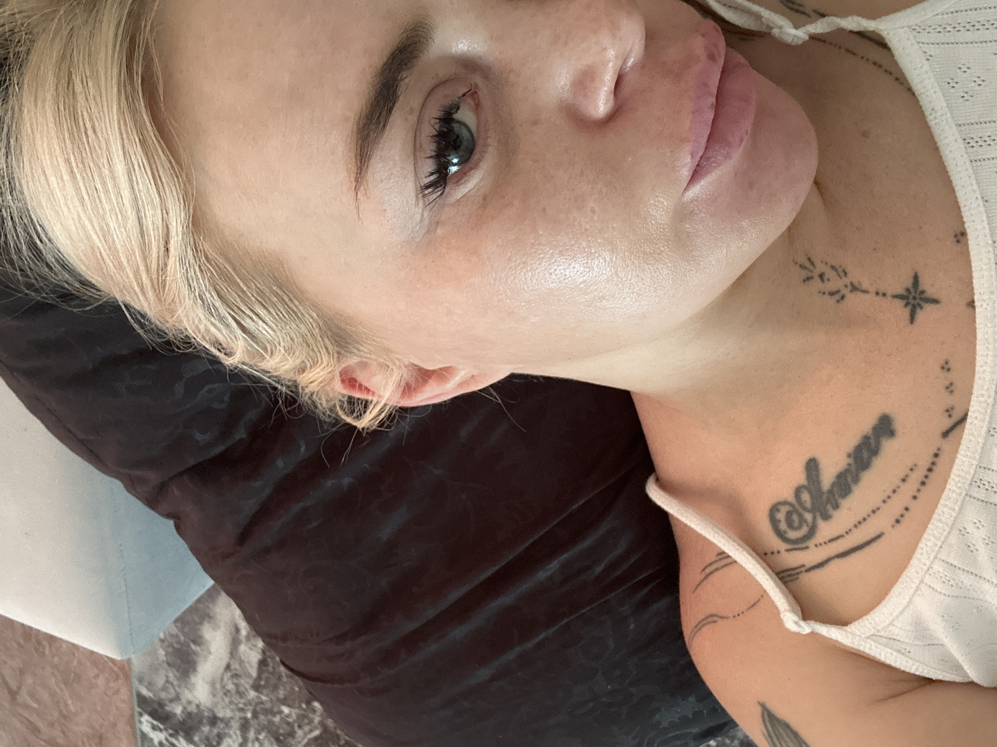 Woman photographed in intimate close-up portraits during rest