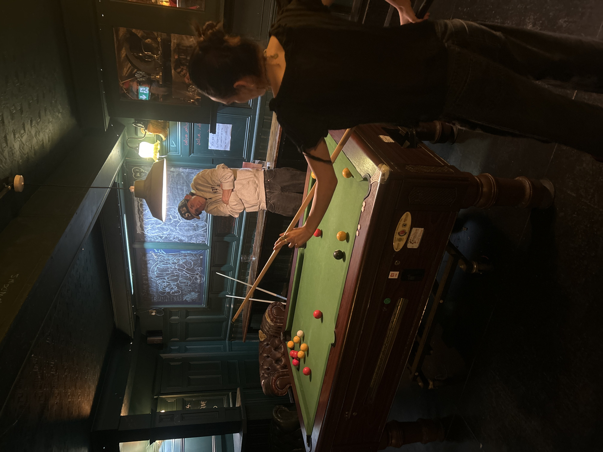 London pub payment terminals display quirky saxophone-playing animal graphics