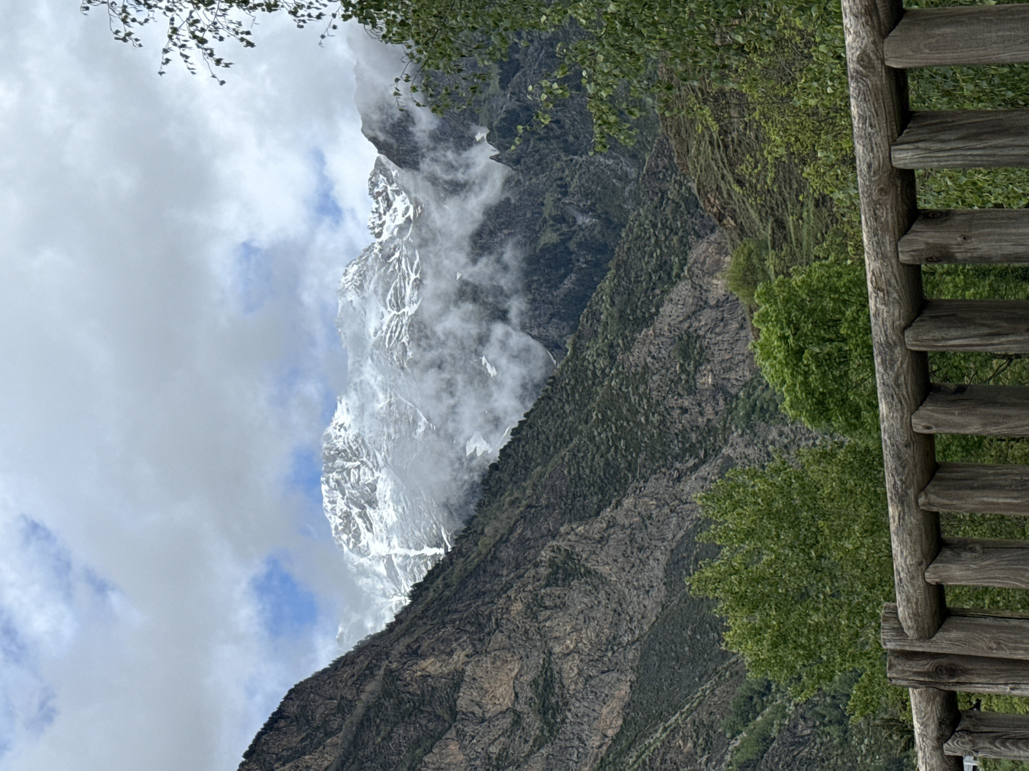Mountain landscape photographed from Benasque viewpoint amid cloudy conditions