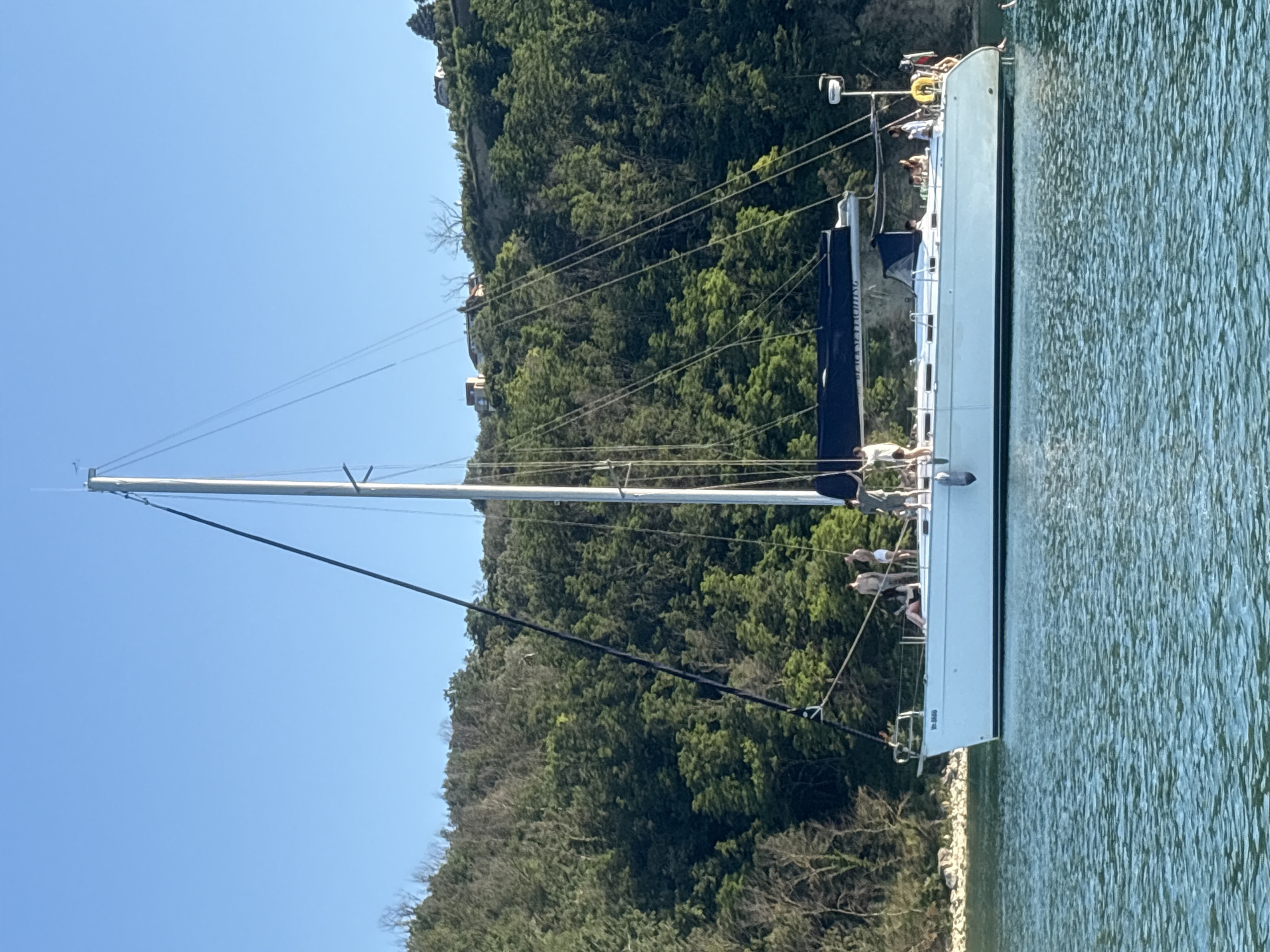 Lazy afternoon on the water near a lighthouse bay