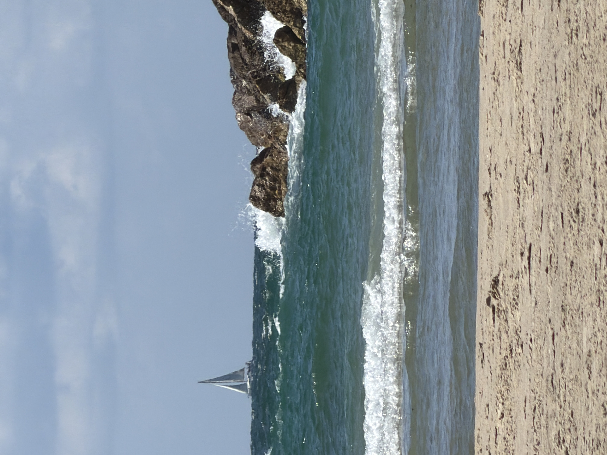 Morning beach scene captured in Tel Aviv with coffee, paddleboarding