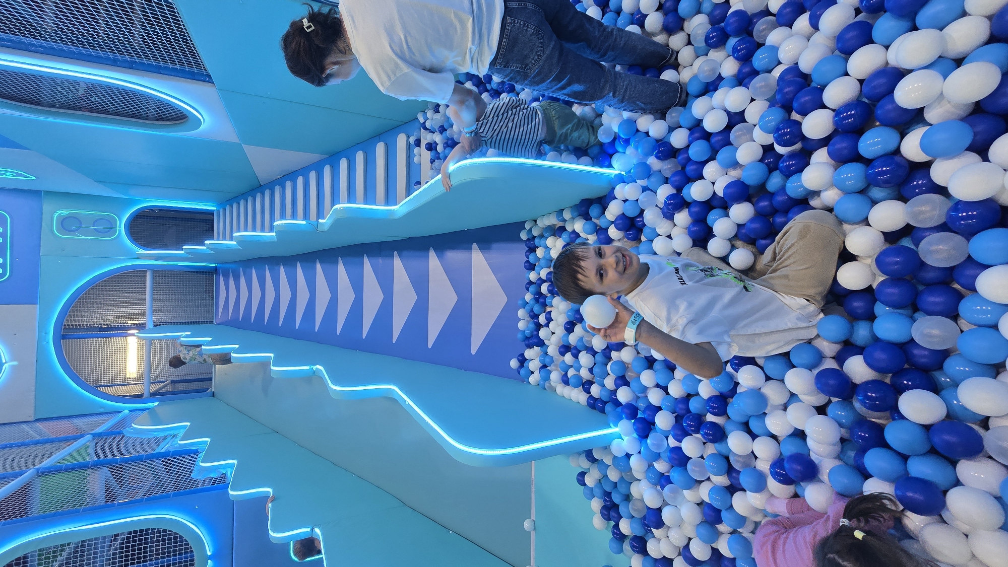 Family outing documented across Izhevsk shopping centers and play venues