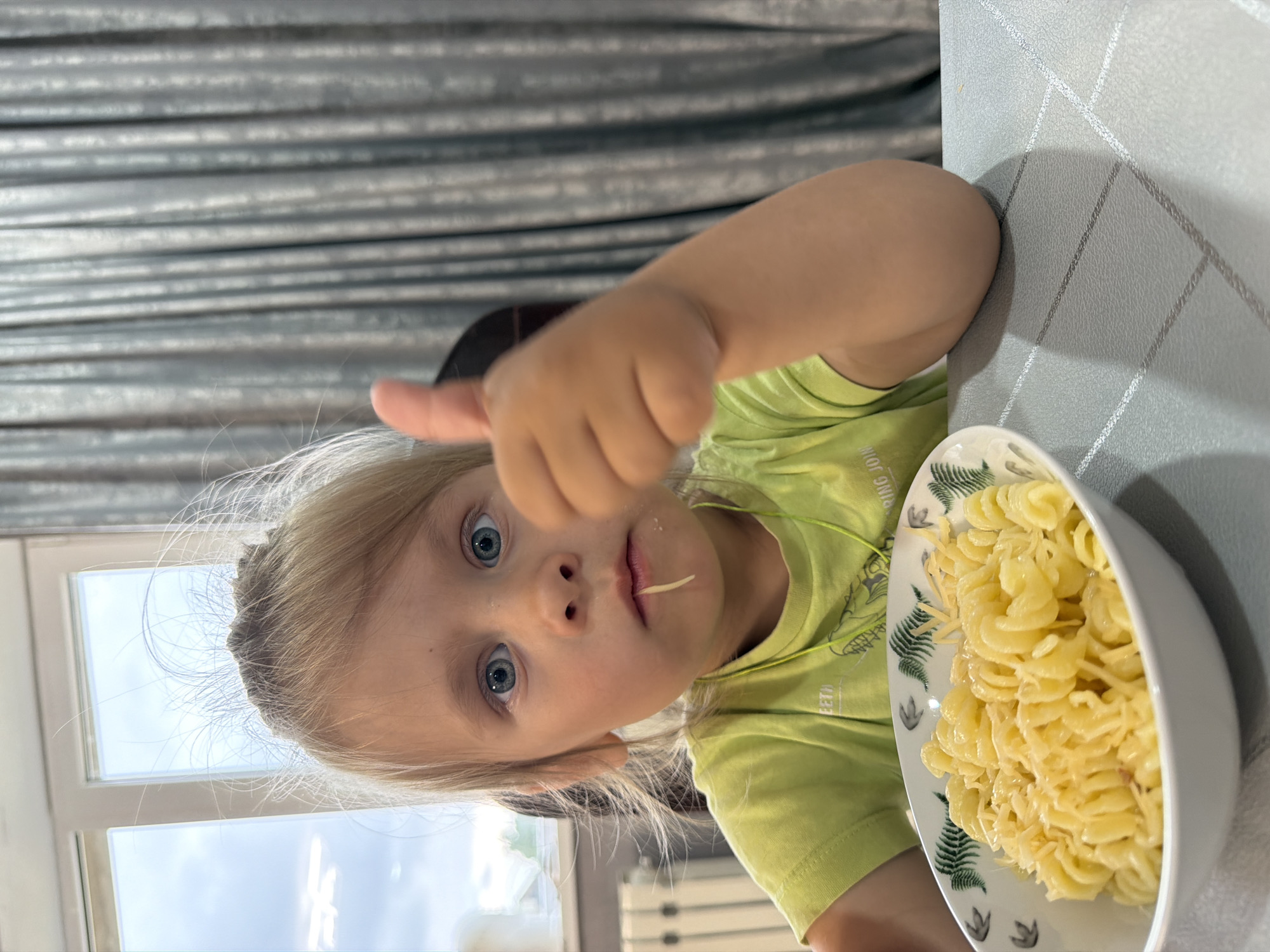 Laid-back morning at home — kids, pasta, and a cat