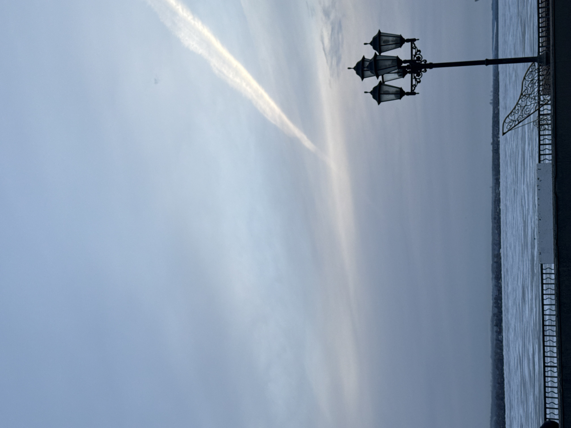Aircraft contrails observed over Votkinsk, Russia streets