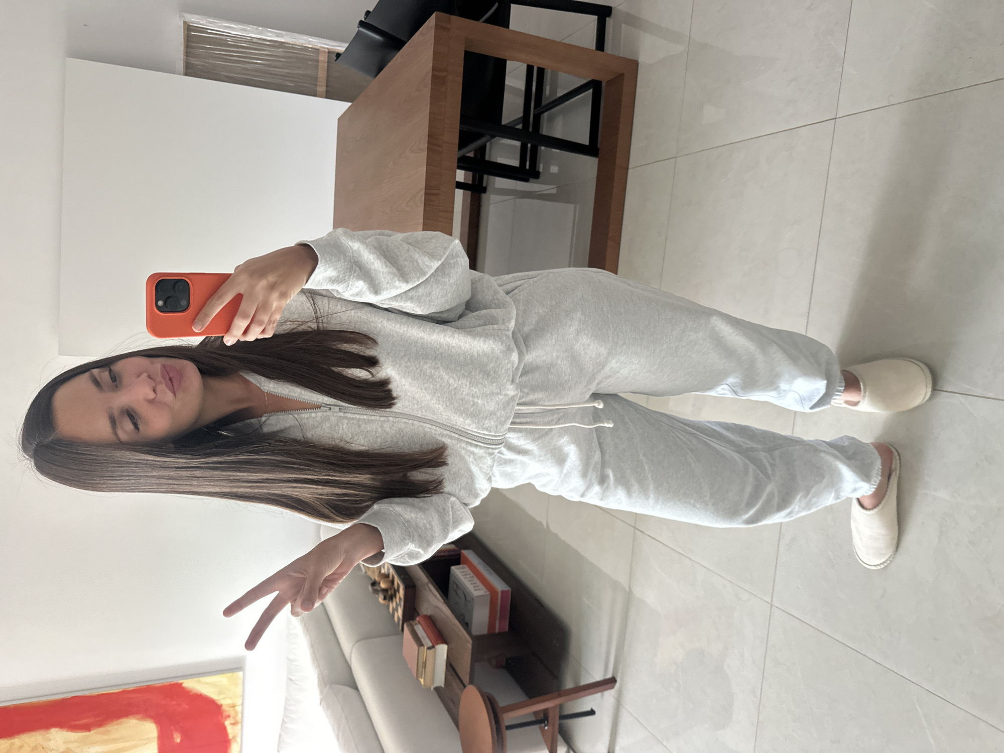 Woman takes selfie indoors in Abu Dhabi