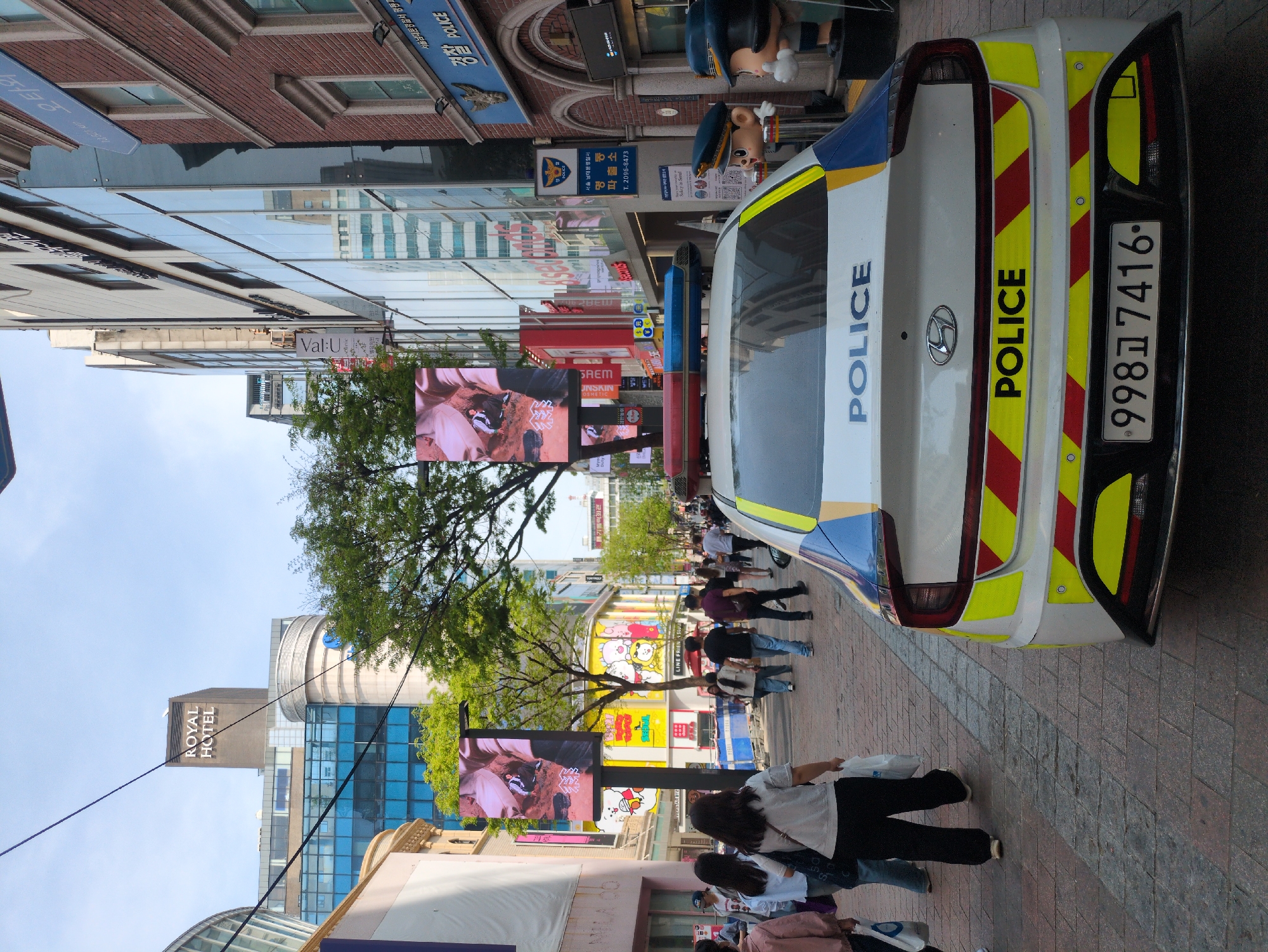 Early morning street life documented across Seoul's Myeongdong district