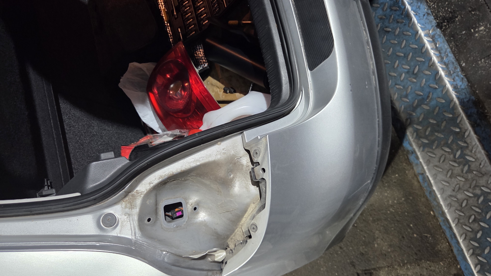Car taillight work and pool maintenance at a residential property
