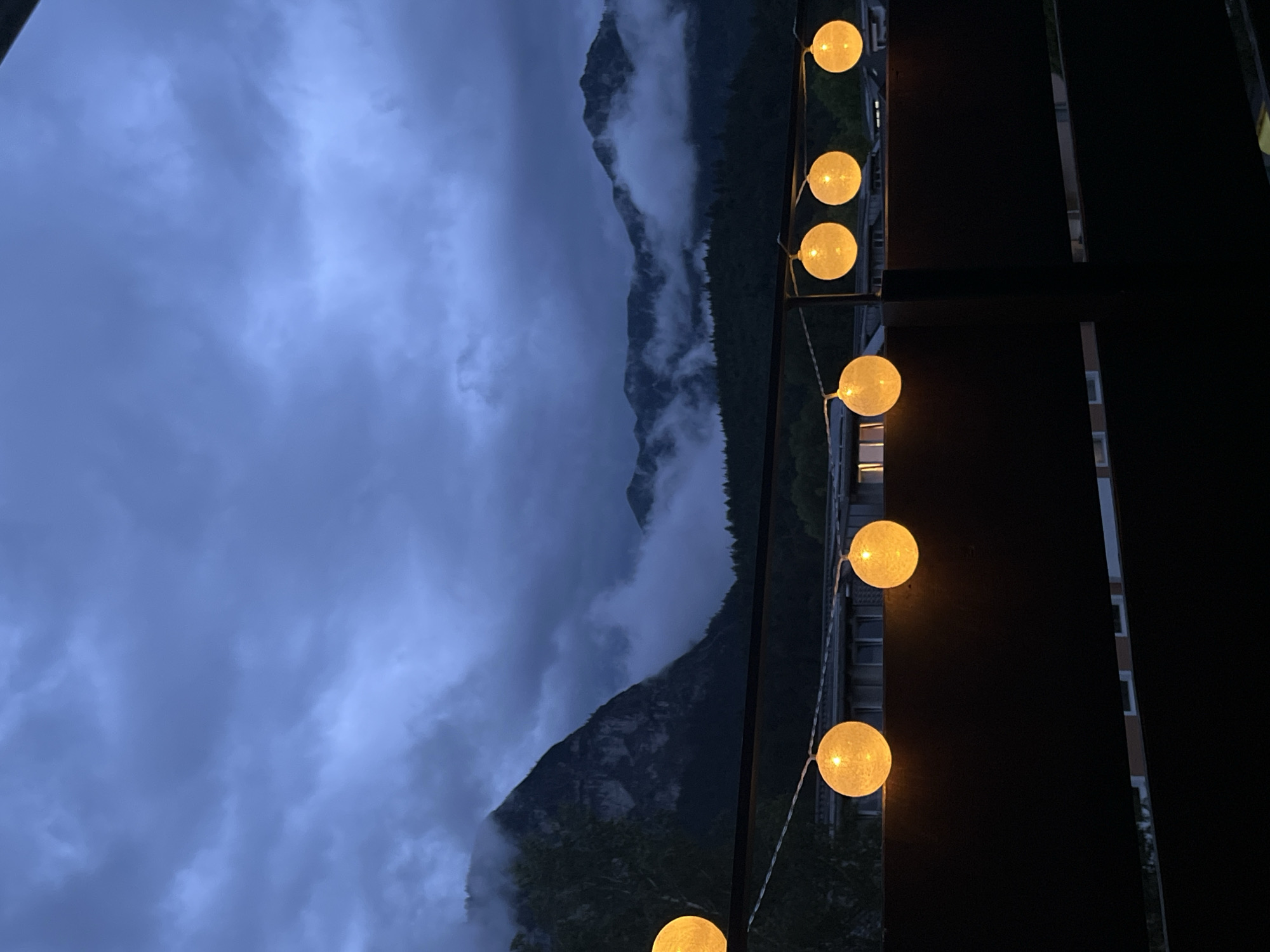 Balcony evening in Garmisch as clouds swallow the Alps