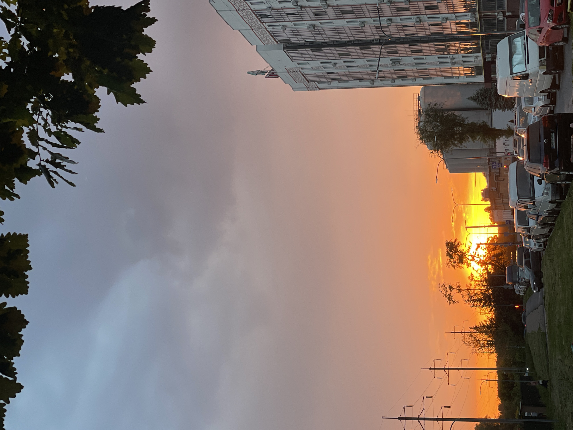 Vibrant sunset illuminates Rozsoshentsi, Ukraine street scene