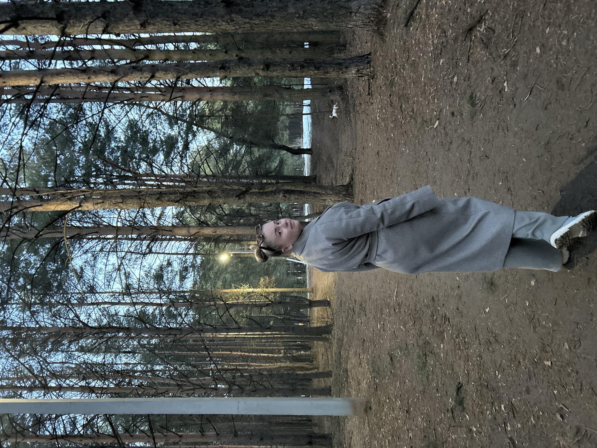 Adult and child enjoy forest walk in Chaikovsky