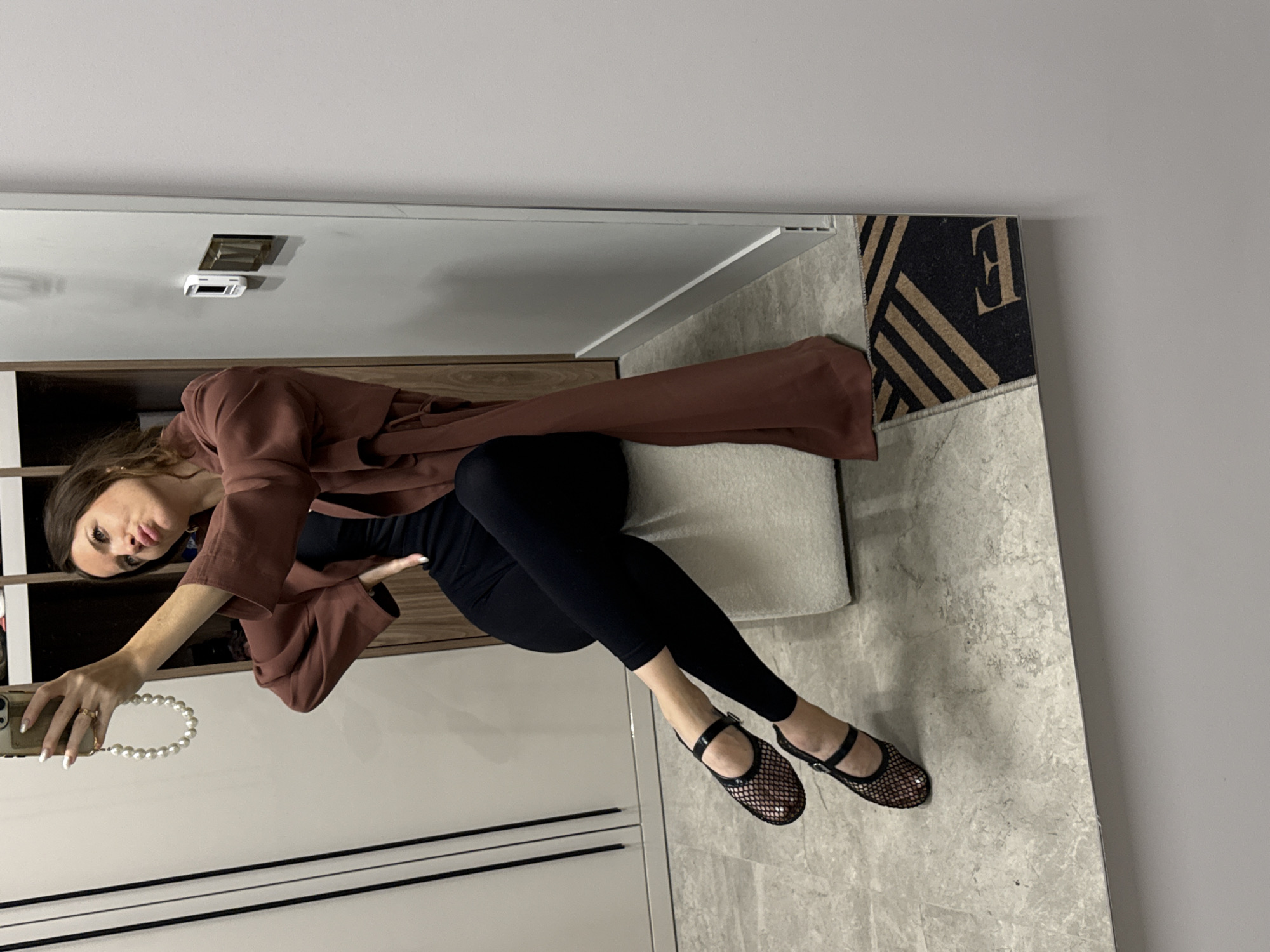 Outfit selfie in a Moscow dressing area, summer 2026