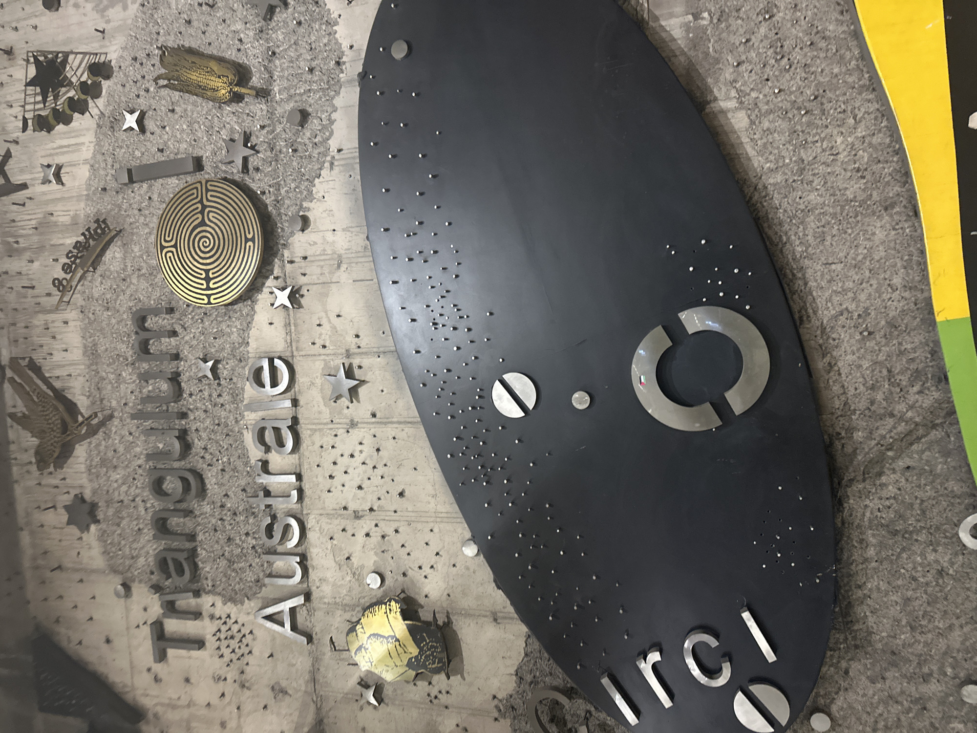 Wall display with metallic objects spotted in Providencia, Chile