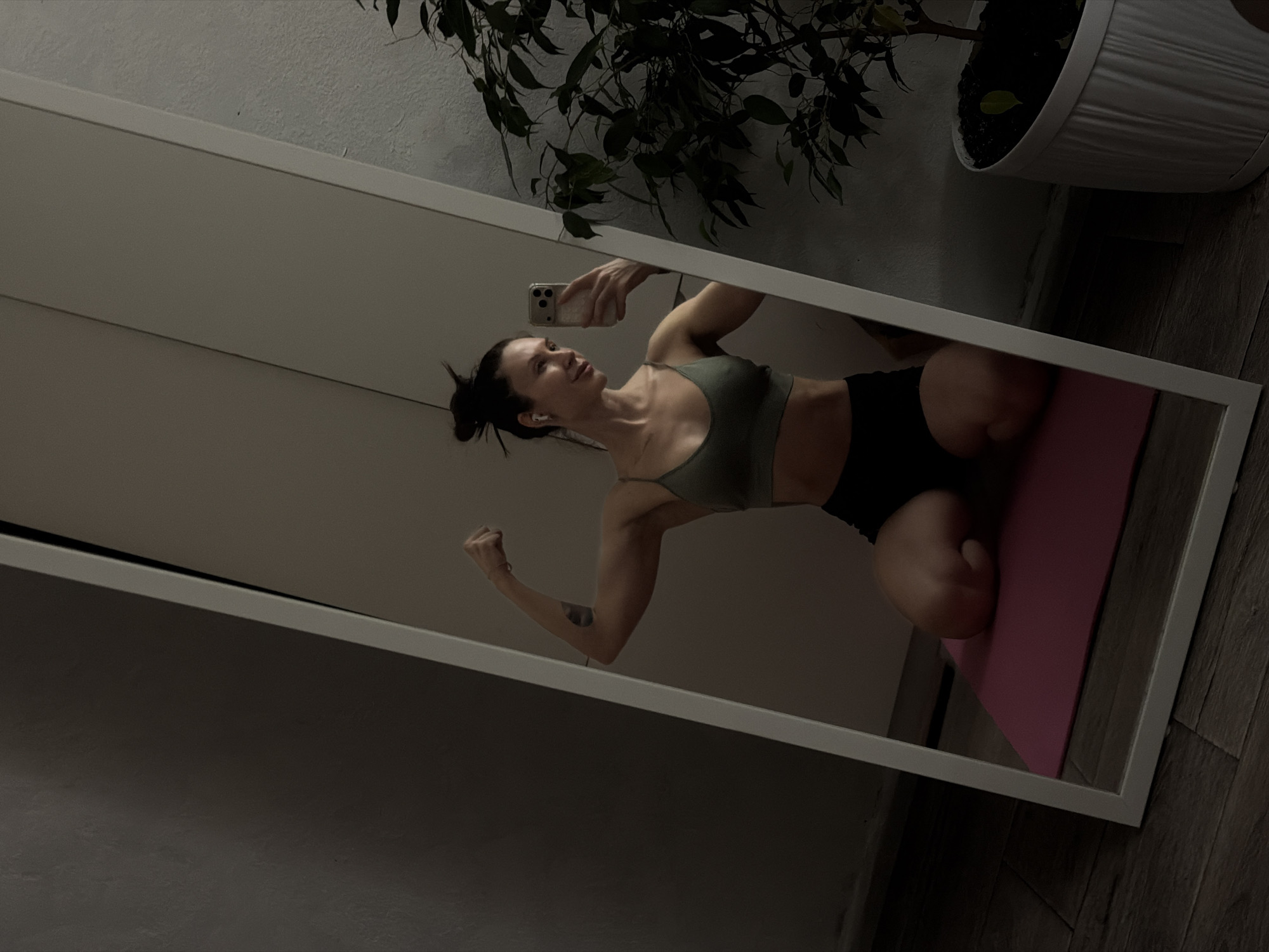 Woman takes workout mirror selfies in Perm, Russia