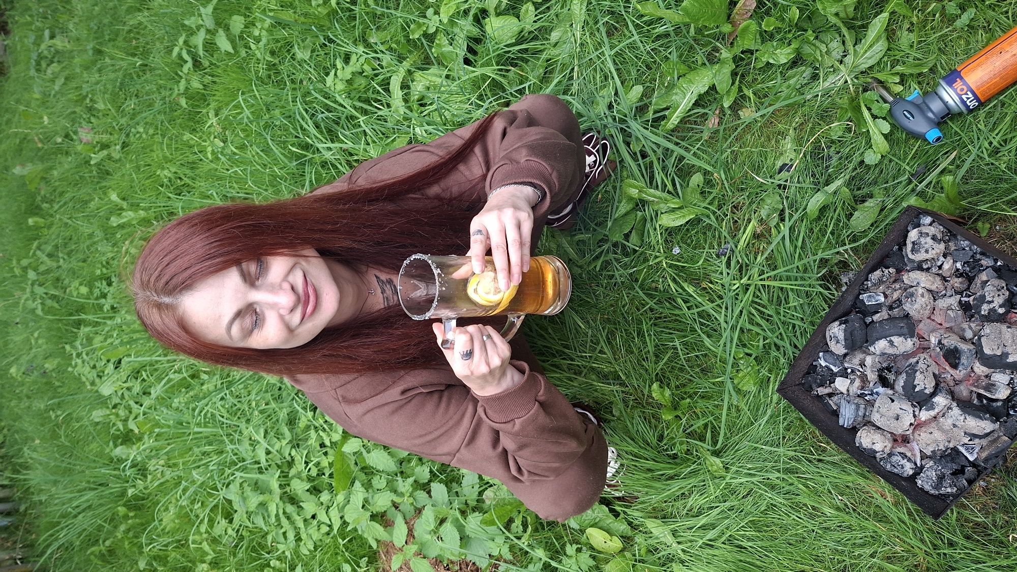 Backyard grill session with drinks on a Belarus summer afternoon