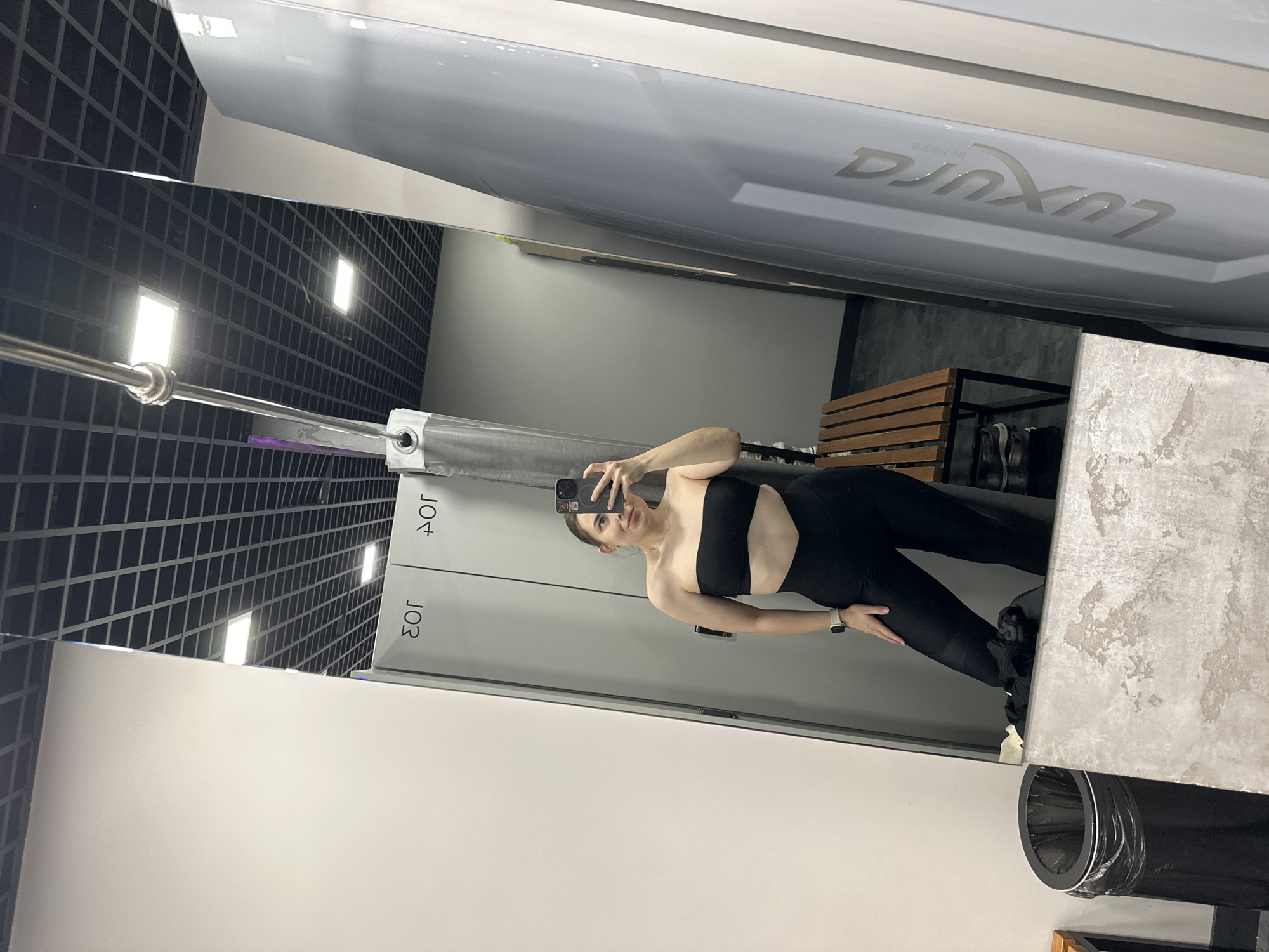 Woman takes selfies at Perm tanning salon, belongings captured