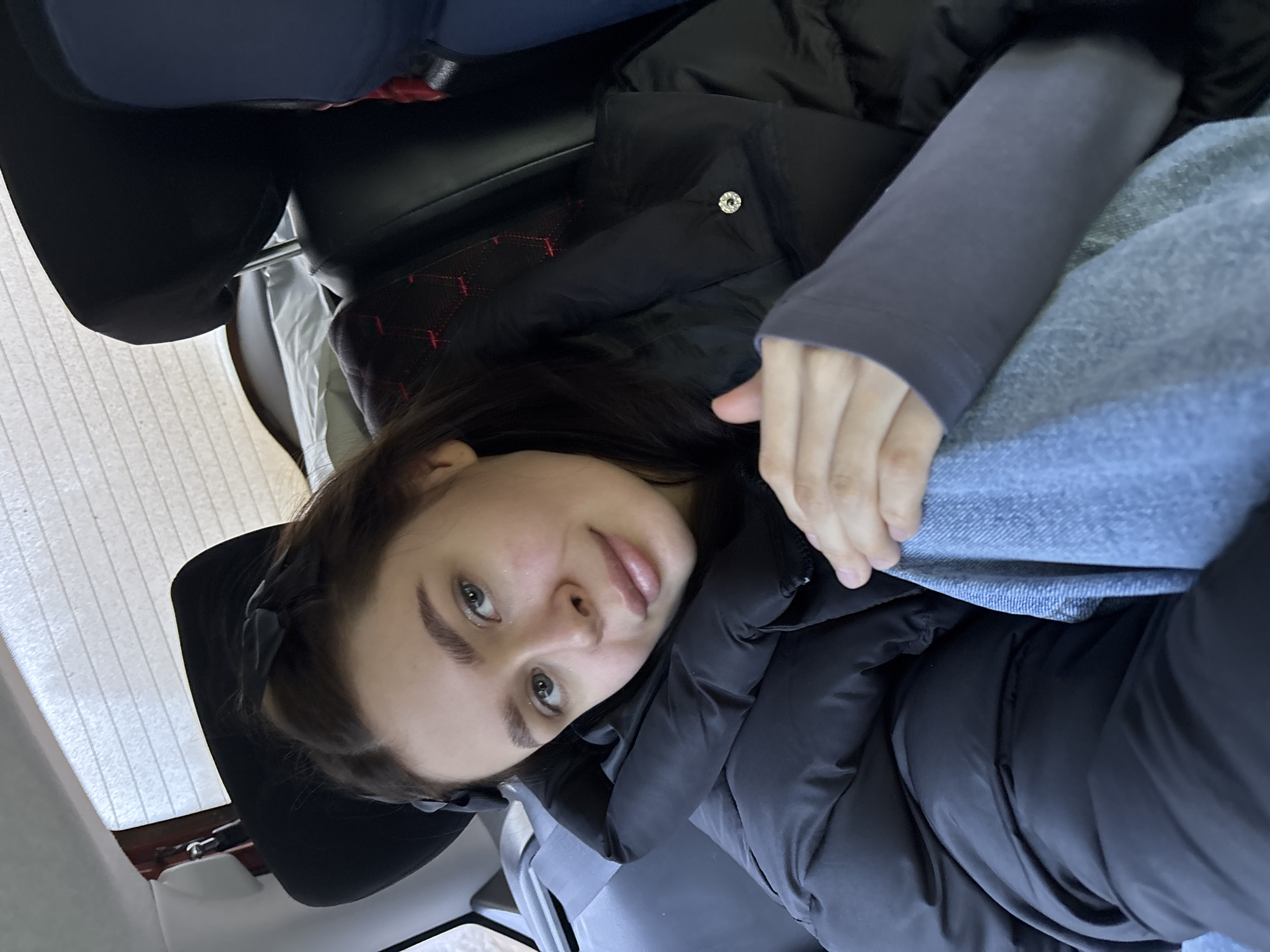 Woman reclining in car seat observed in Dubrova, Russia
