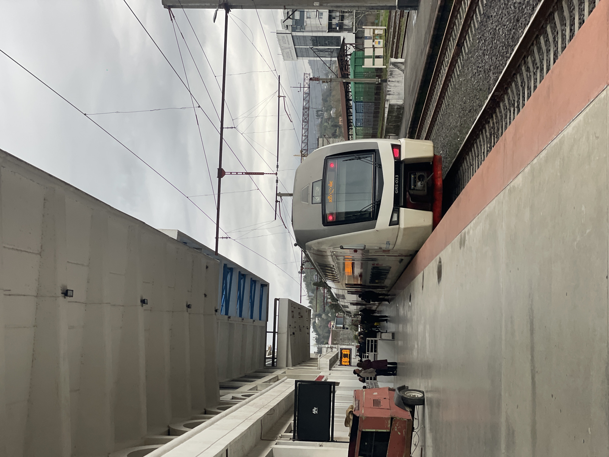 Train journey documented along Batumi's overcast coastline