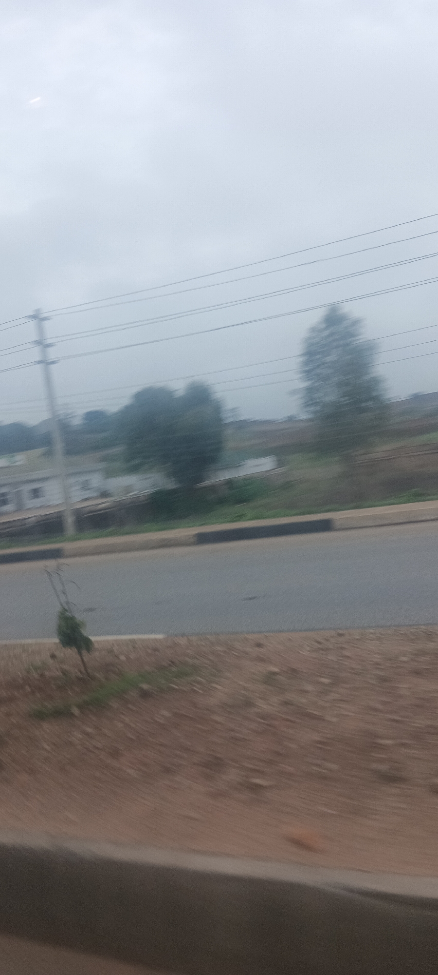Vehicle journey documented through rainy streets over 90 minutes
