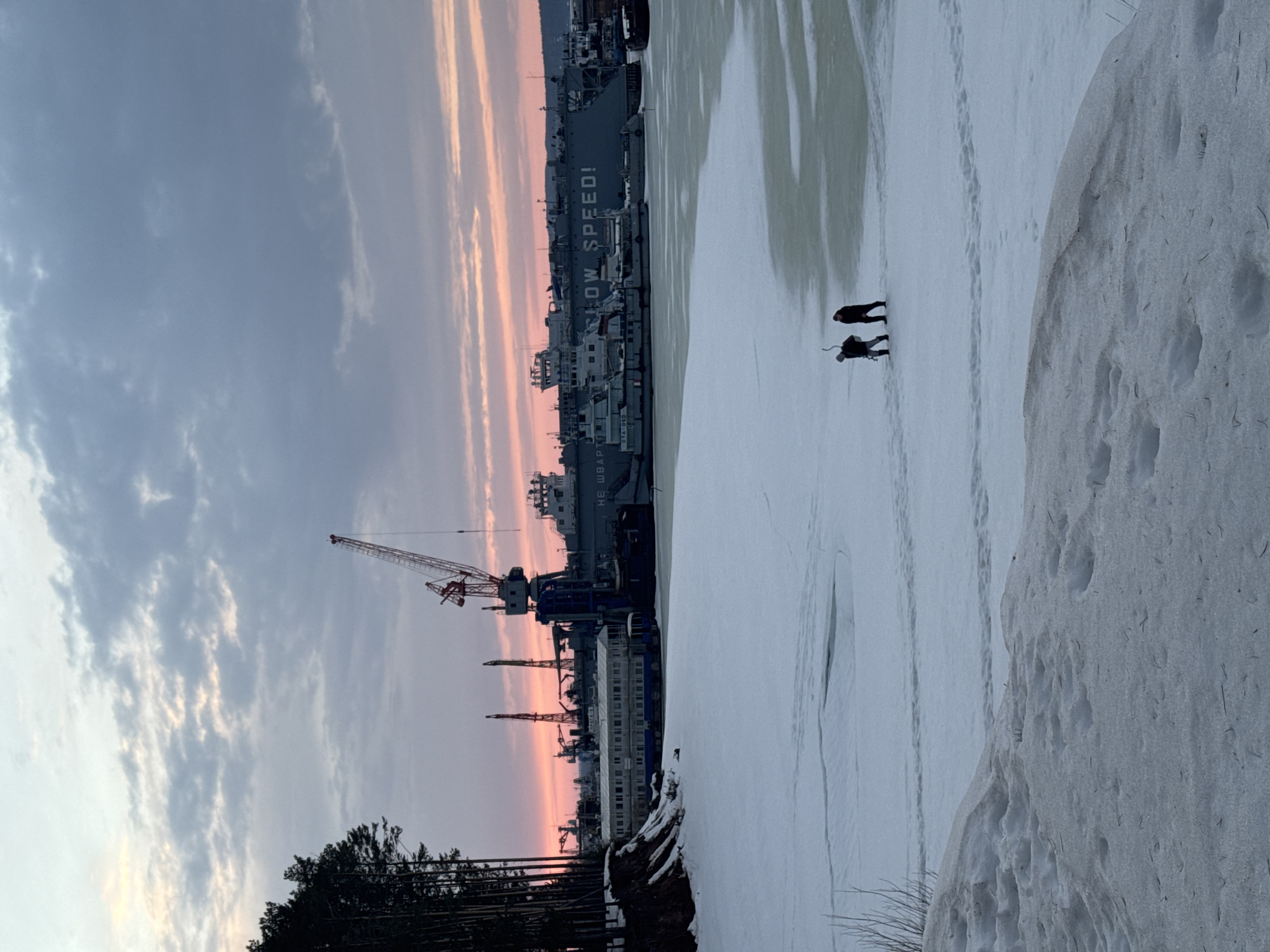 Winter twilight scenes documented across frozen Chaikovsky, Russia