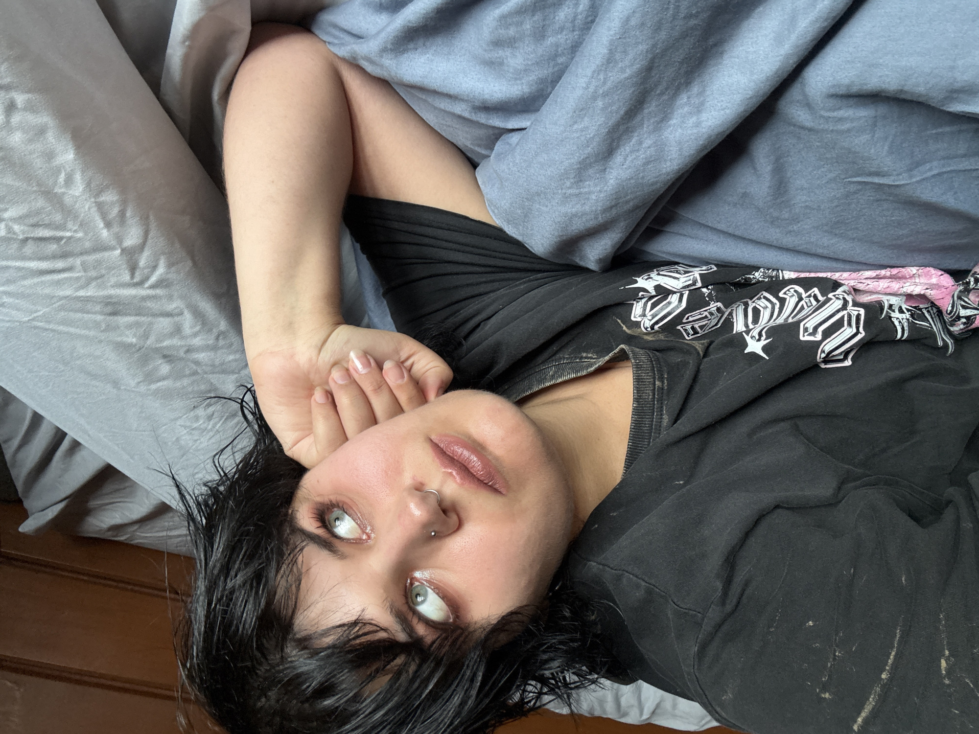 Lazy morning in bed, koi drifting in a garden pond.