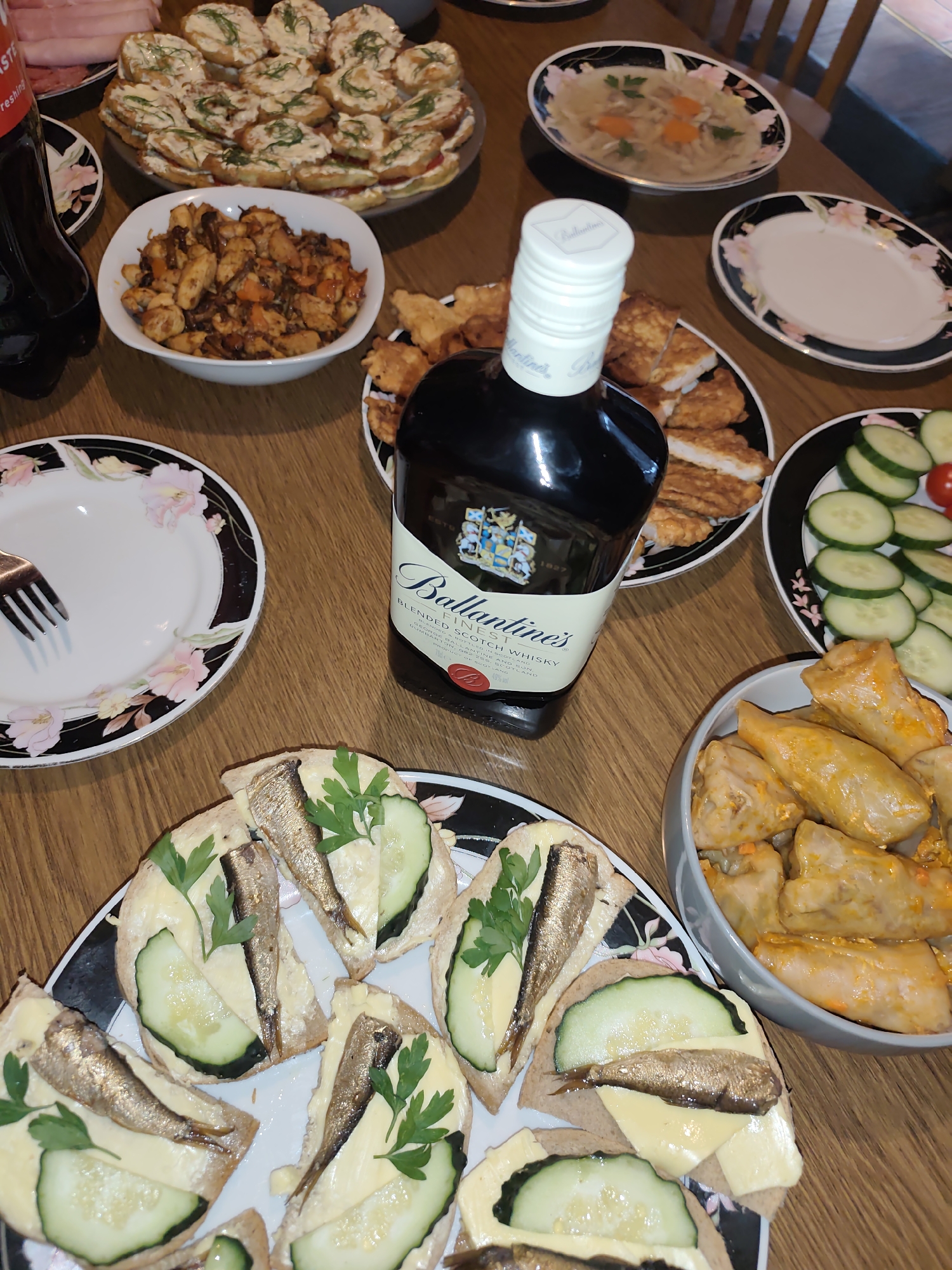 Whisky and food spread at a gathering in Roundfort, Ireland