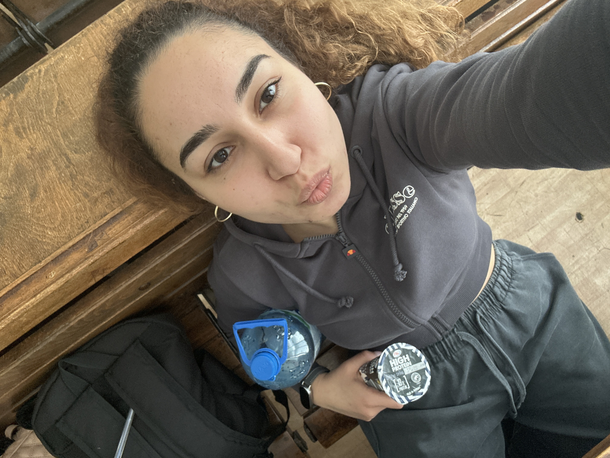 Women take selfies at wooden surface in Burgas