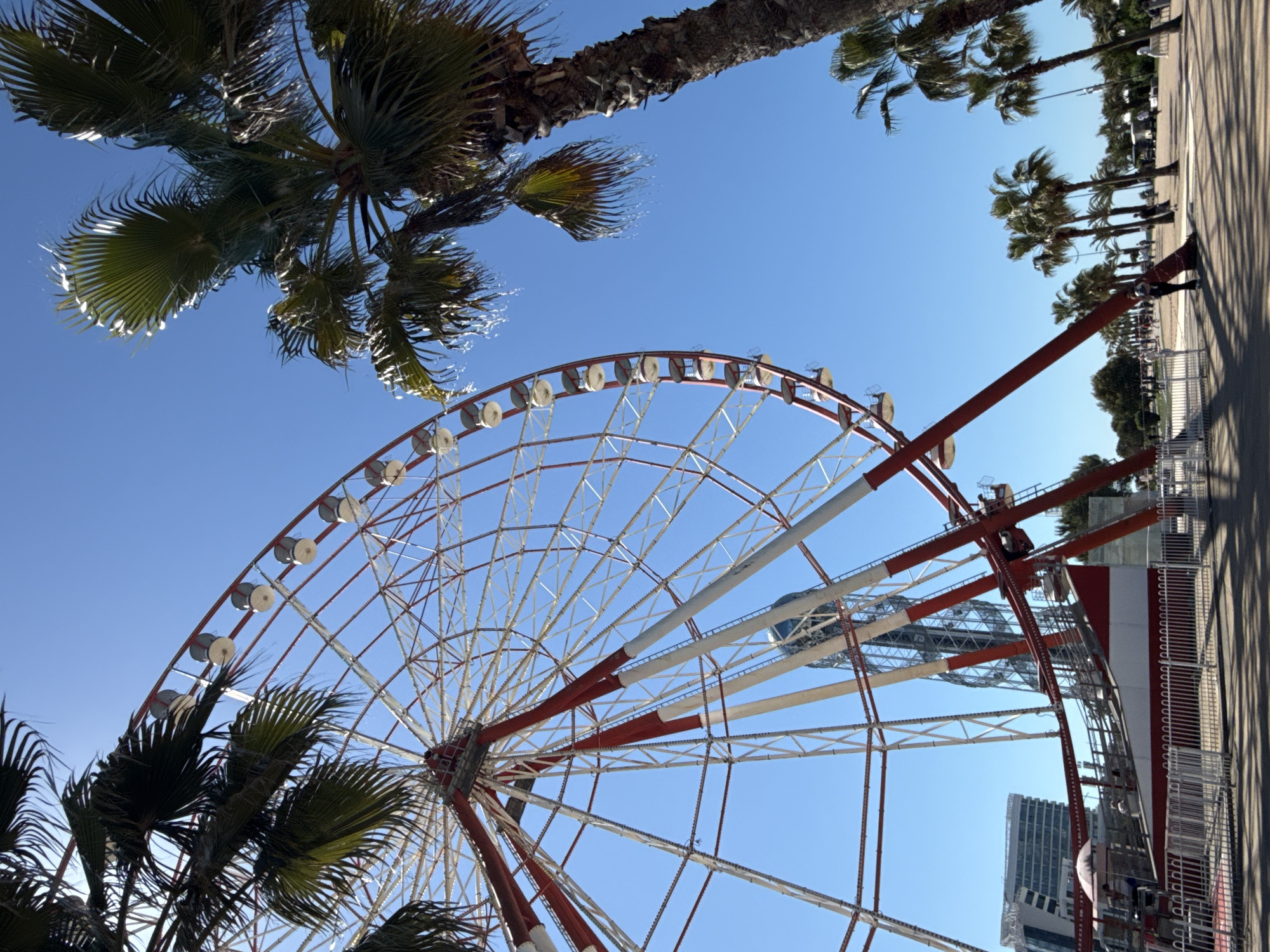 Tourist captures sunny day at Batumi waterfront amusement area