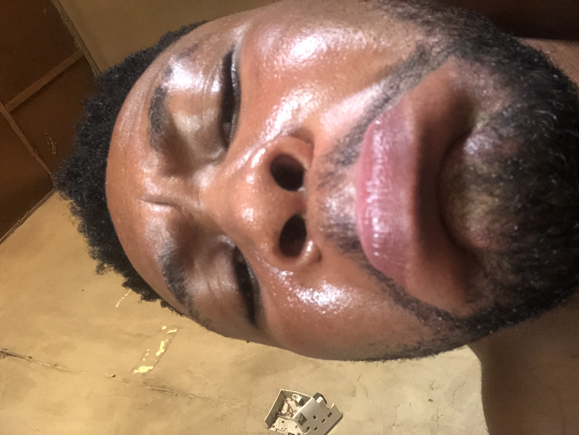 Portrait session captures Black man in multiple close-up shots