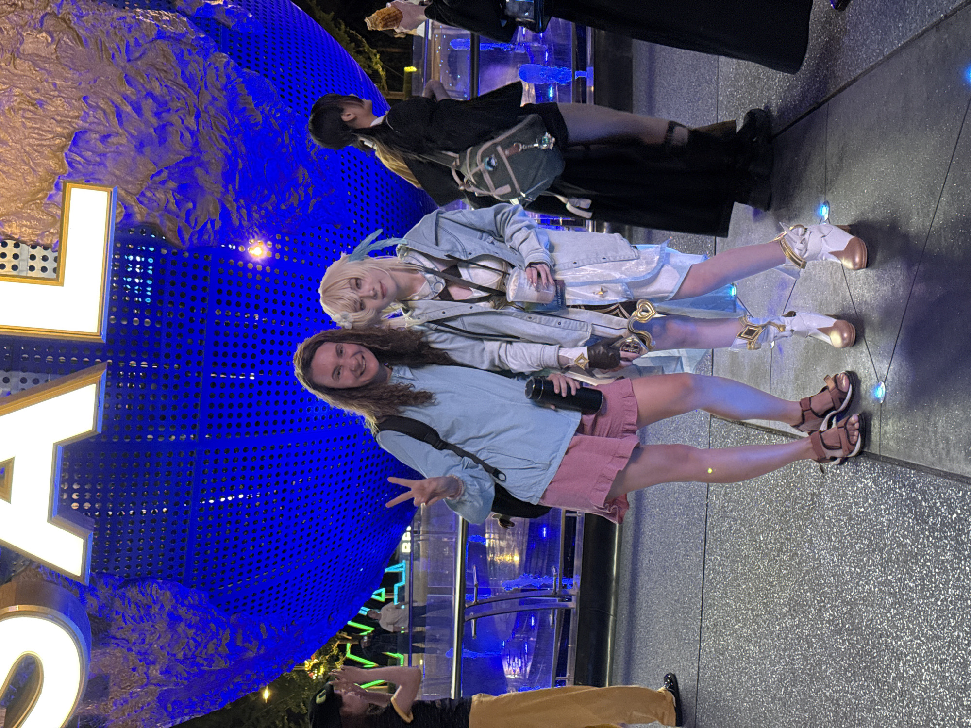 Tourists gather at Universal Studios globe in Beijing