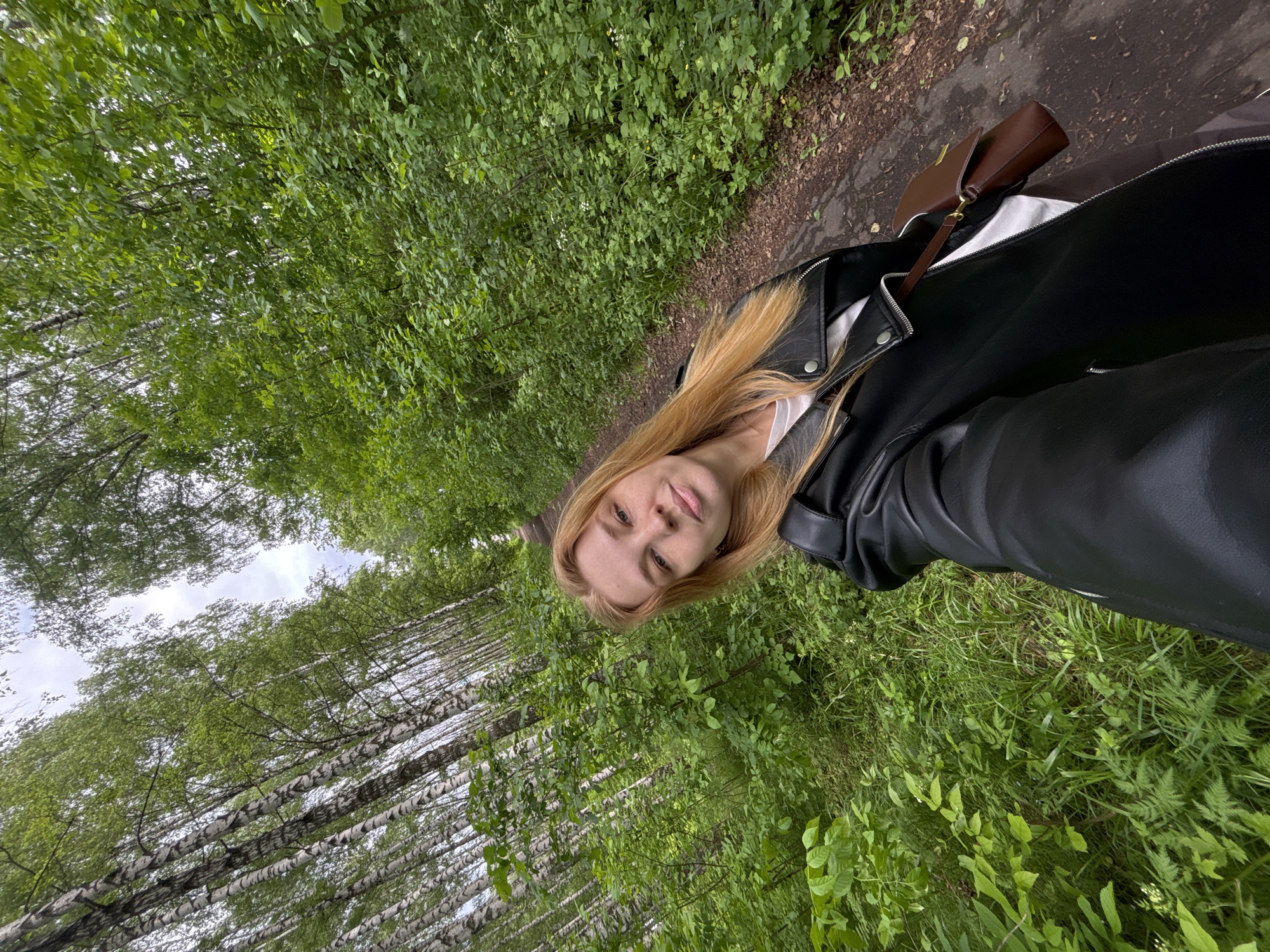 Woman and child travel through Yaroslavl on morning outing