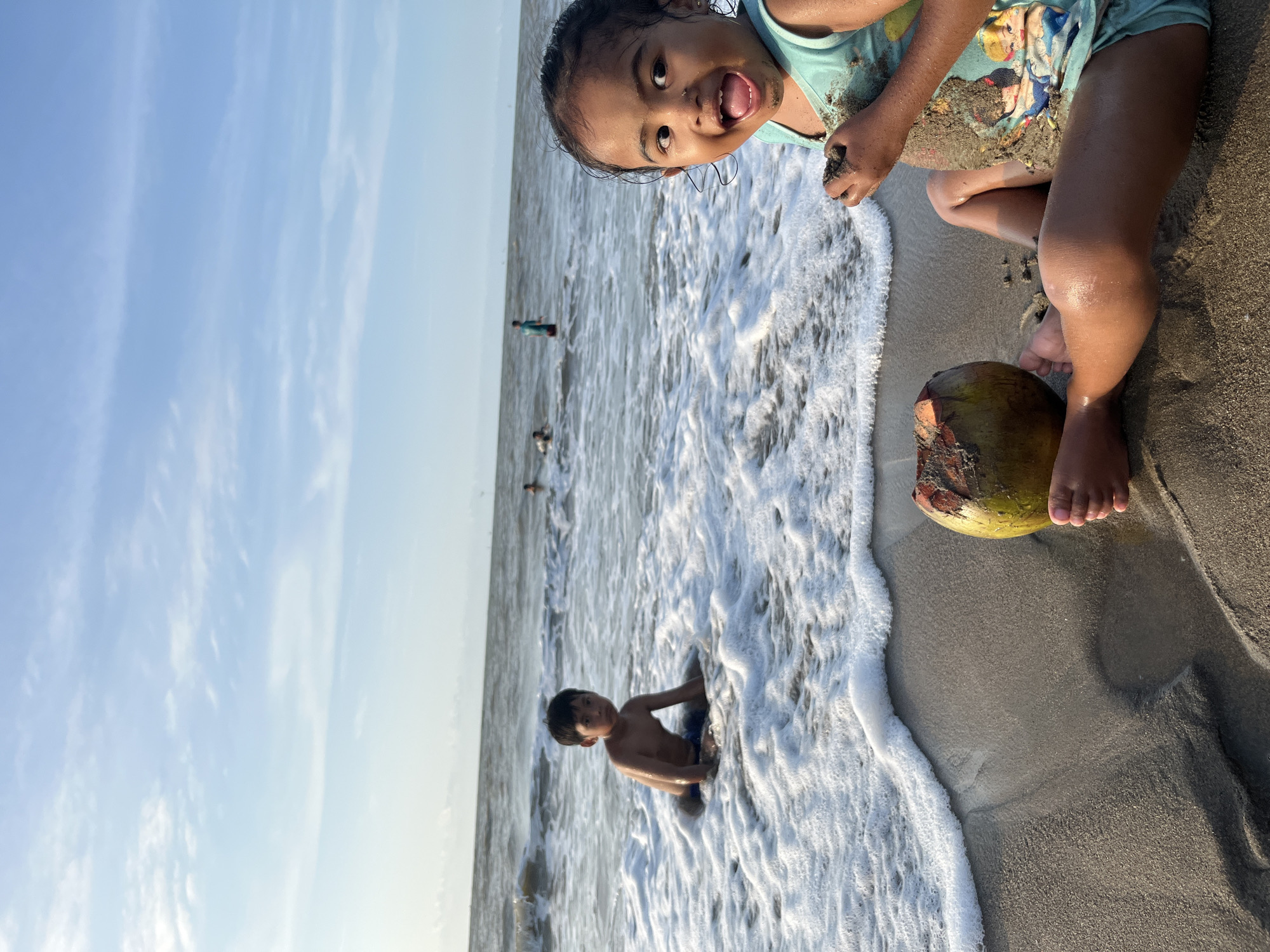 Laid-back beach day in Lhokseumawe, waves and coconuts included