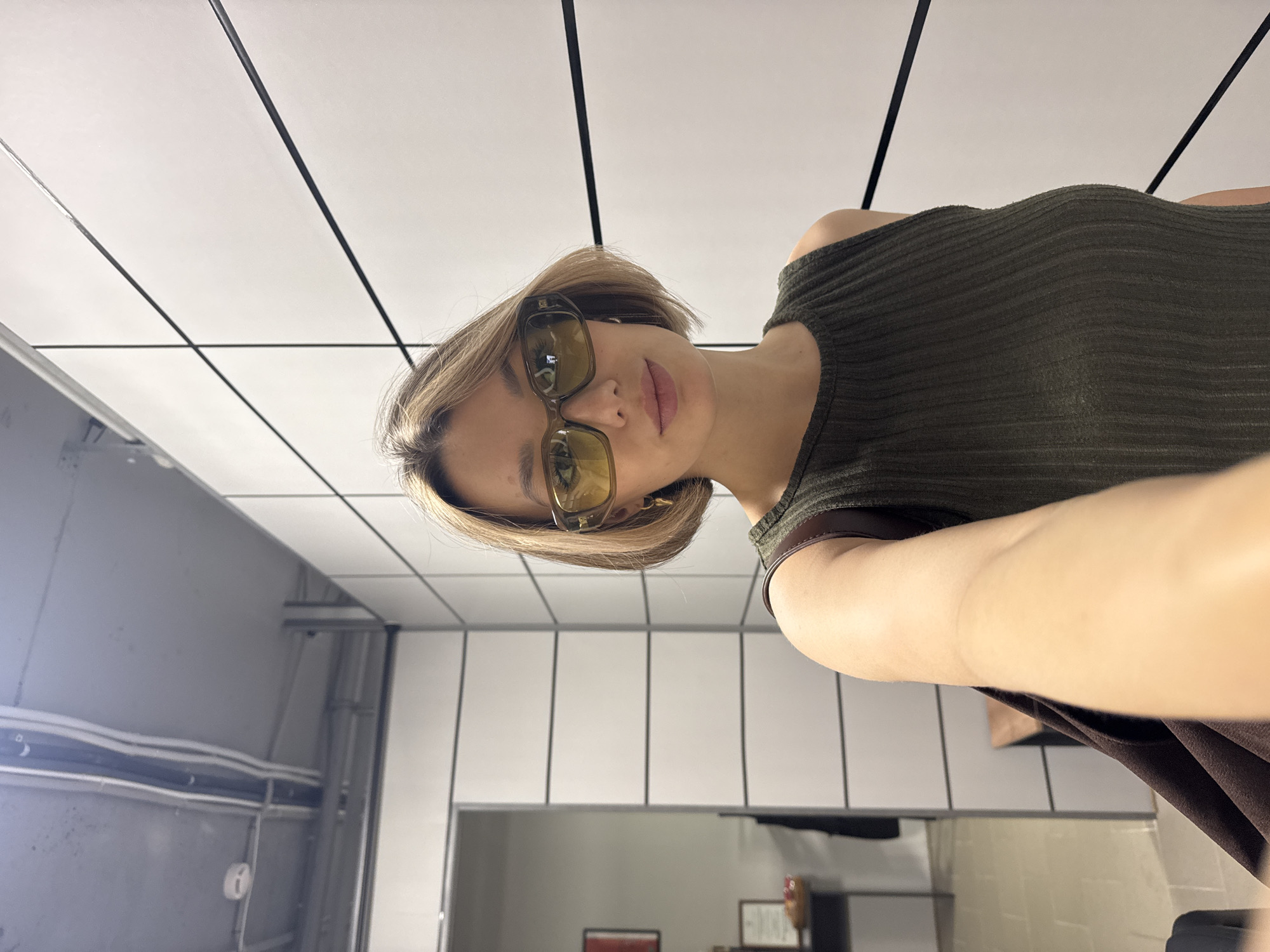 Woman documents selfie session across multiple locations