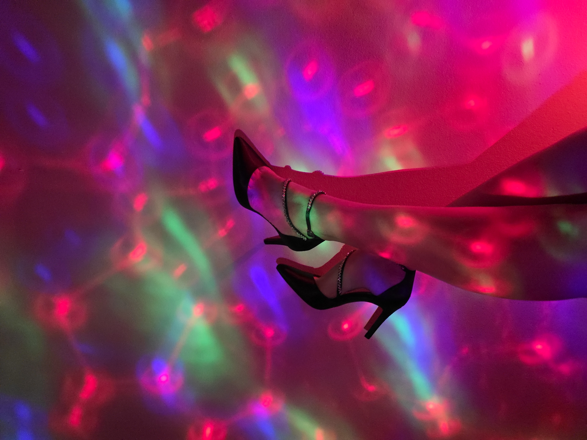 Evening scenes captured: nighttime sky and colorful lighting display
