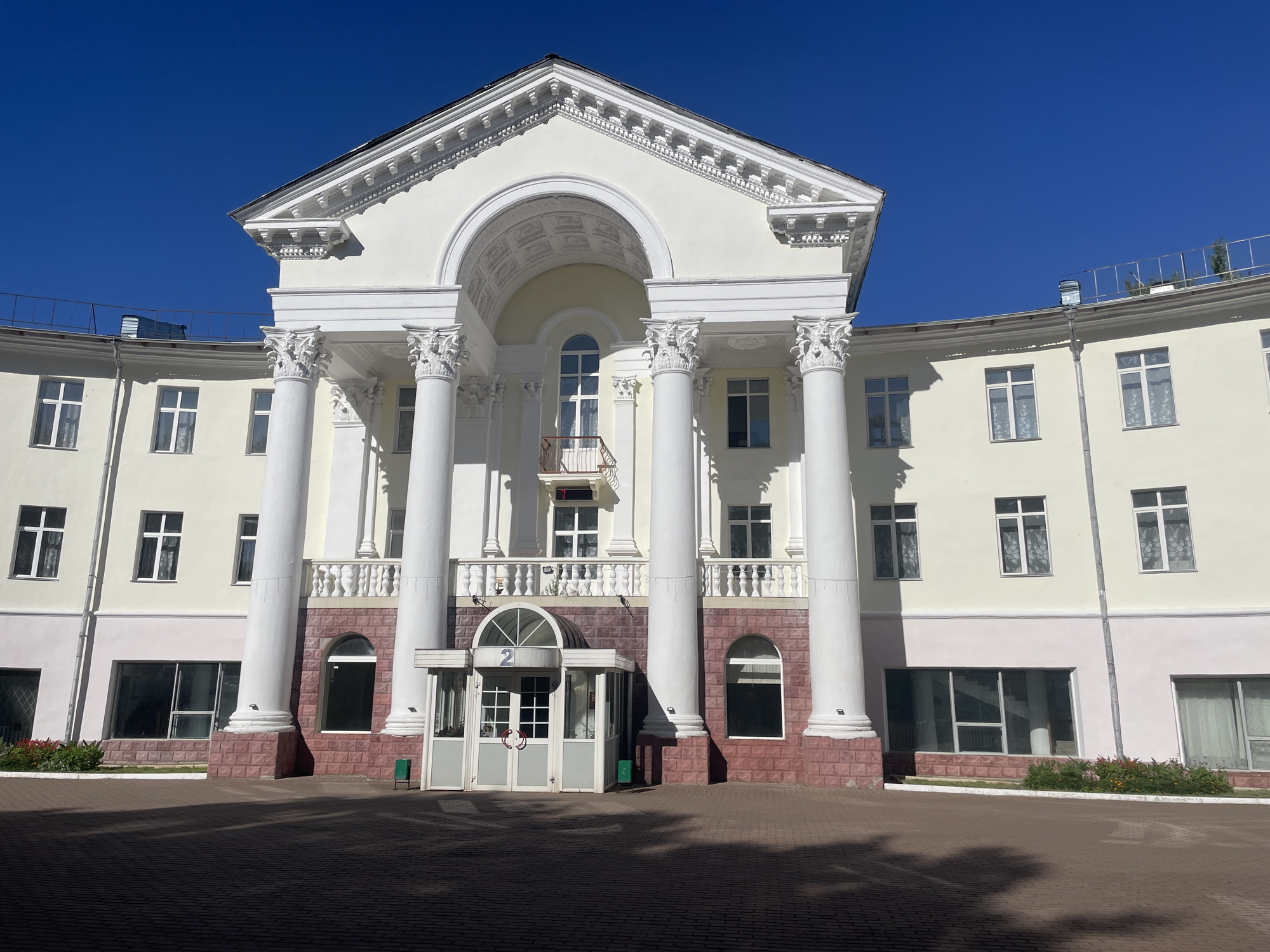Classical yellow building with columns near Дорохово, Russia
