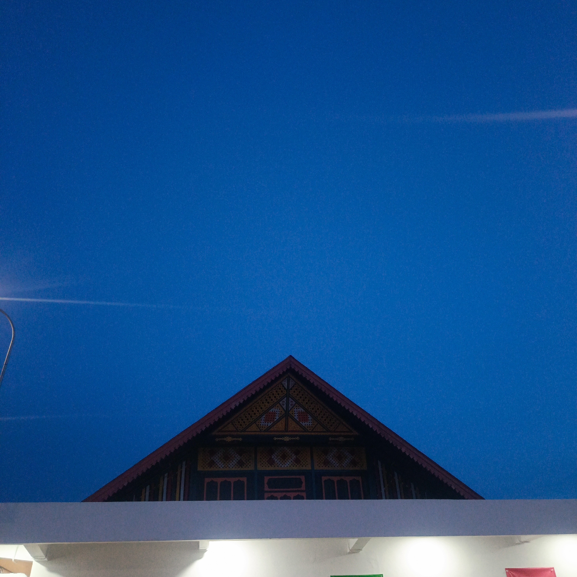 Dusk to night at a mosque and roadside stop in Aceh