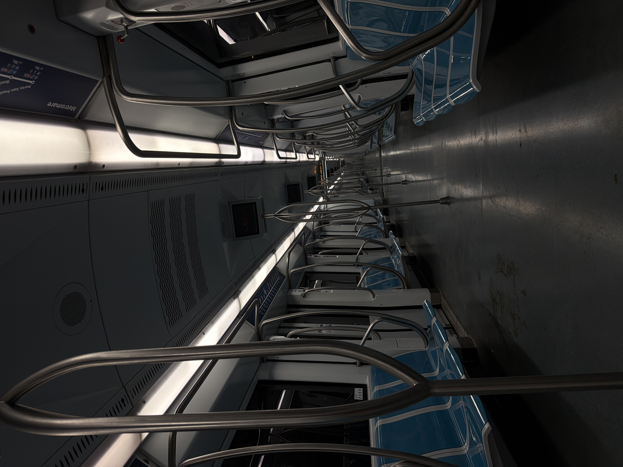 Nearly empty Rome Metro car observed during evening hours