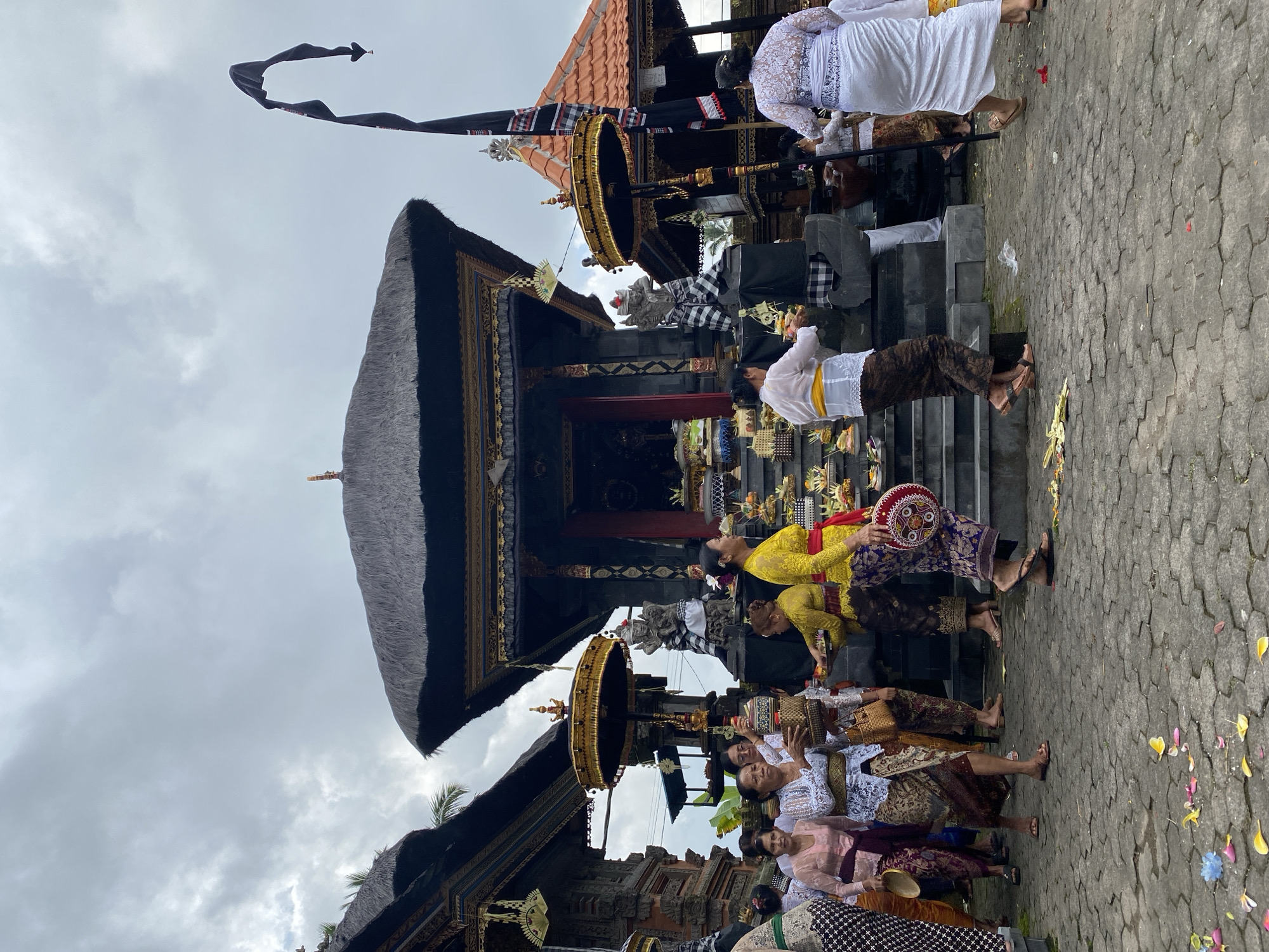 Balinese temple ceremony in Gianyar with offerings and traditional dress