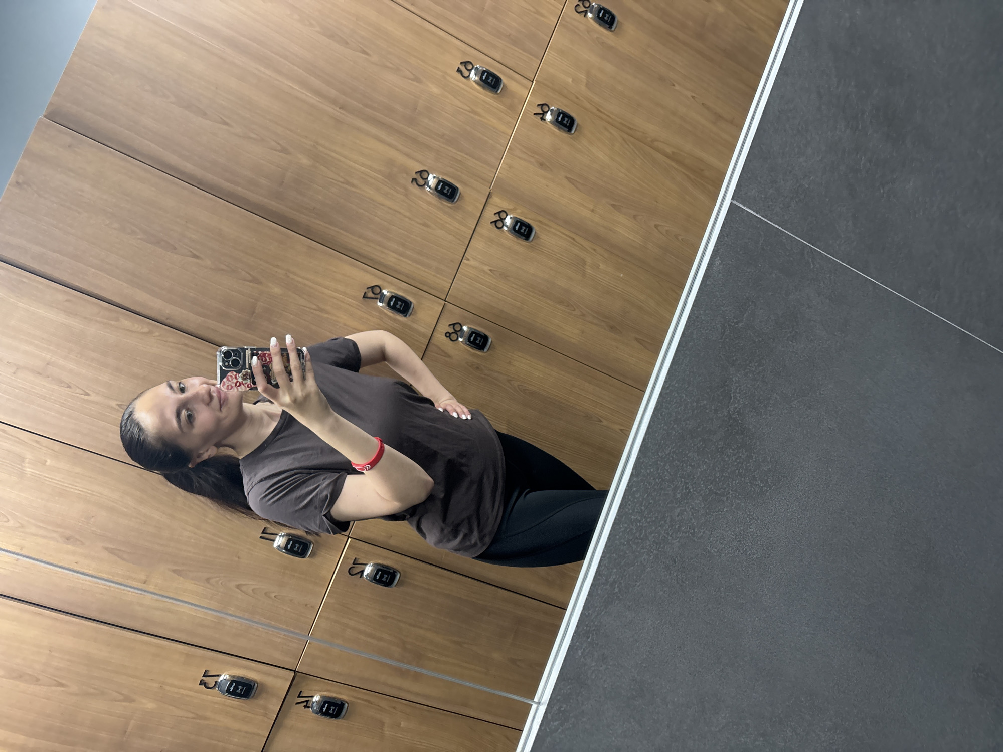 Woman takes mirror selfie in Sochi locker room