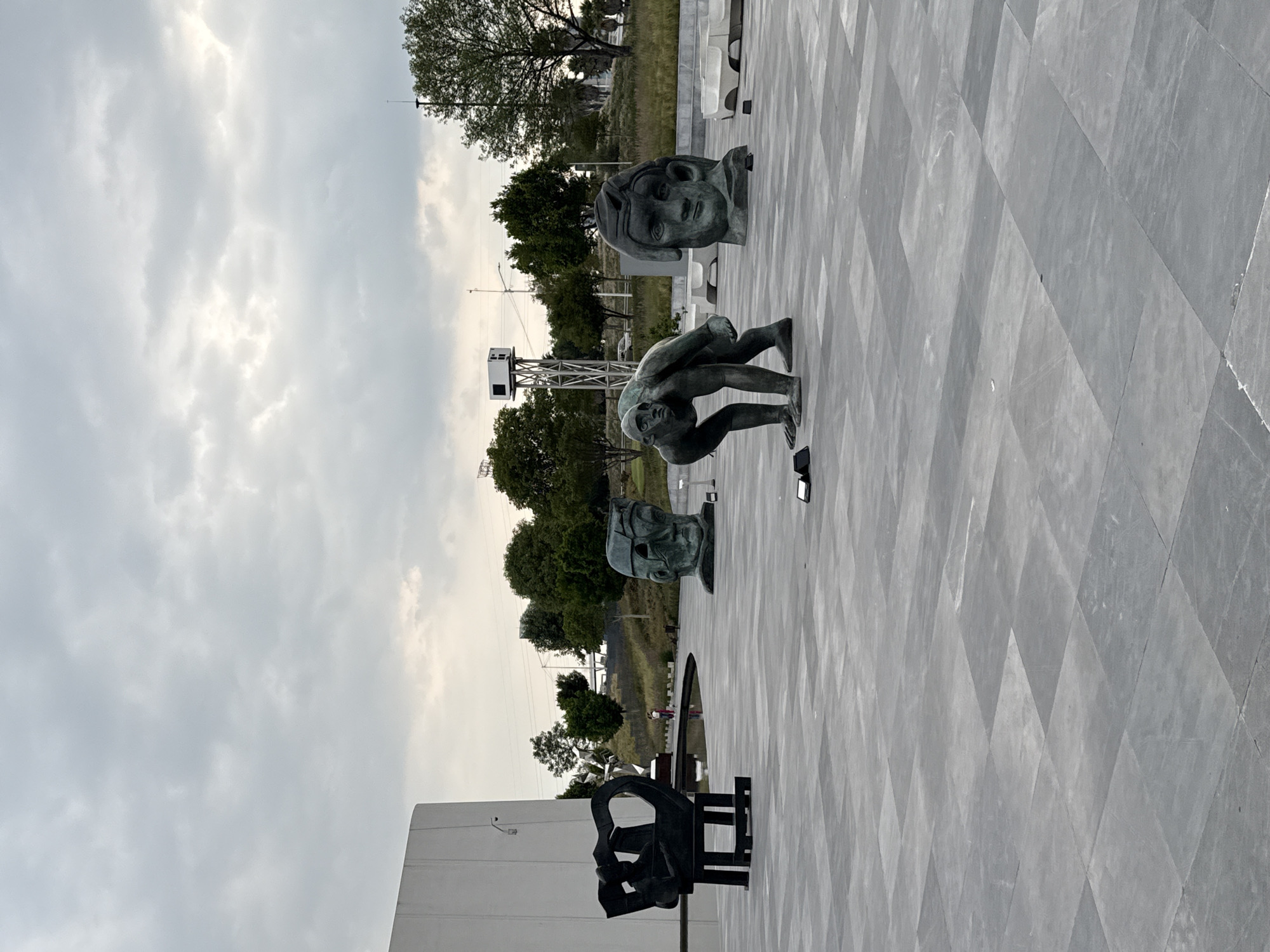 Visitor documents baroque museum sculptures and architecture in Mexico