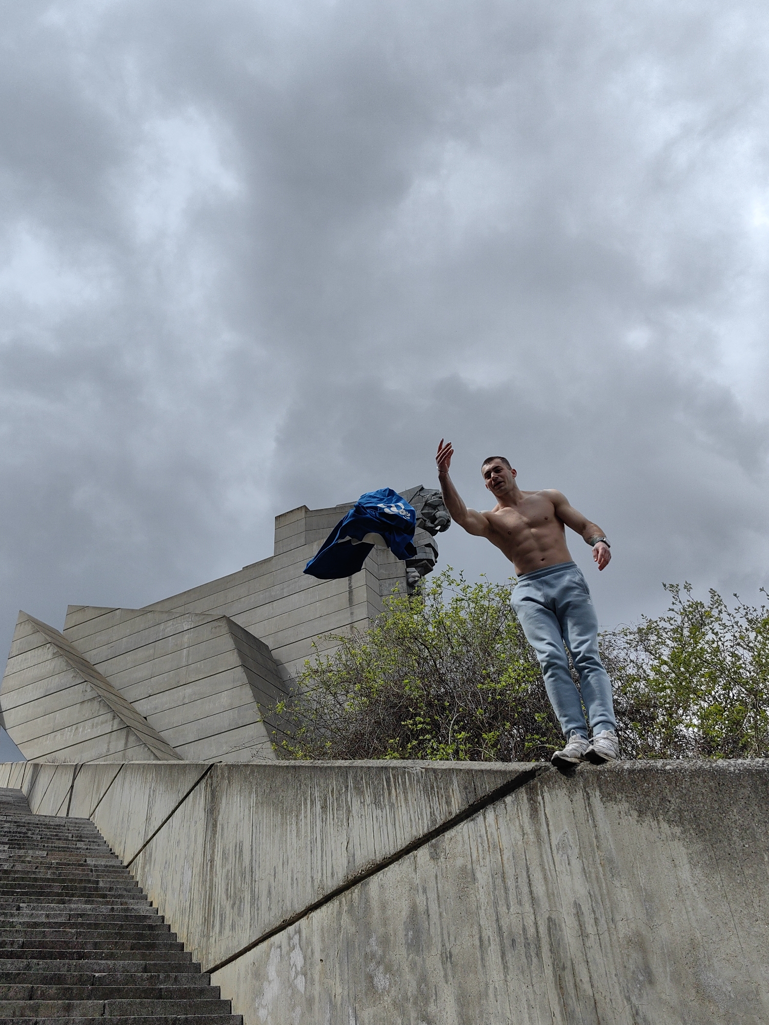 Man photographed suspended horizontally at Bulgarian State Monument
