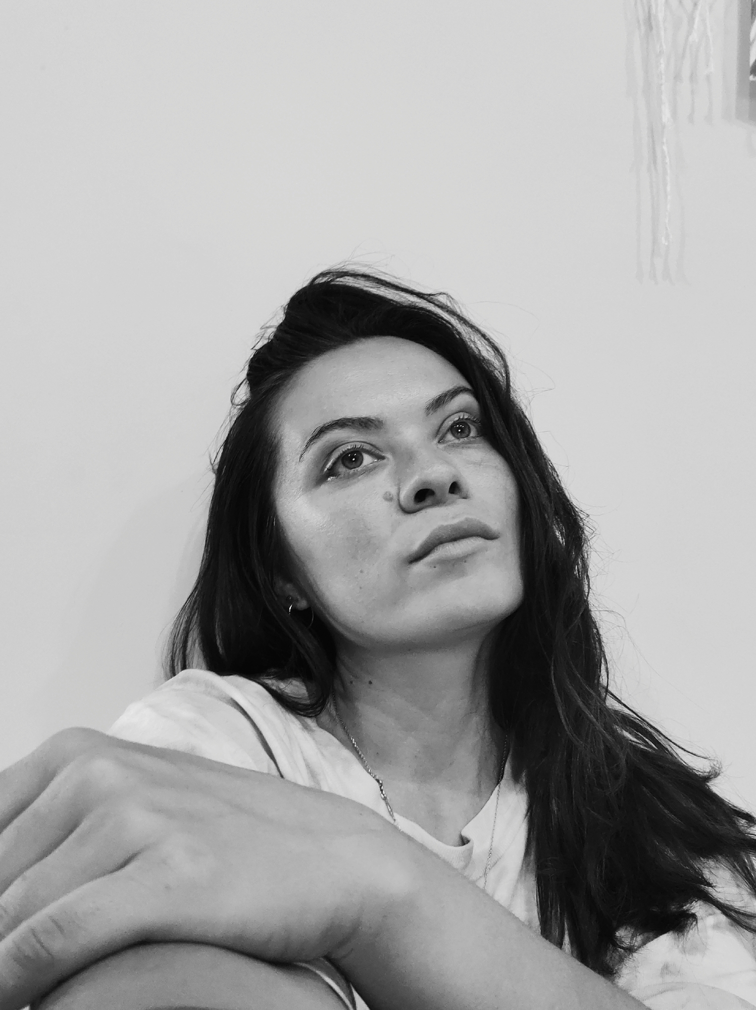 Black and white portraits and indoor candids with a toddler and flowers.