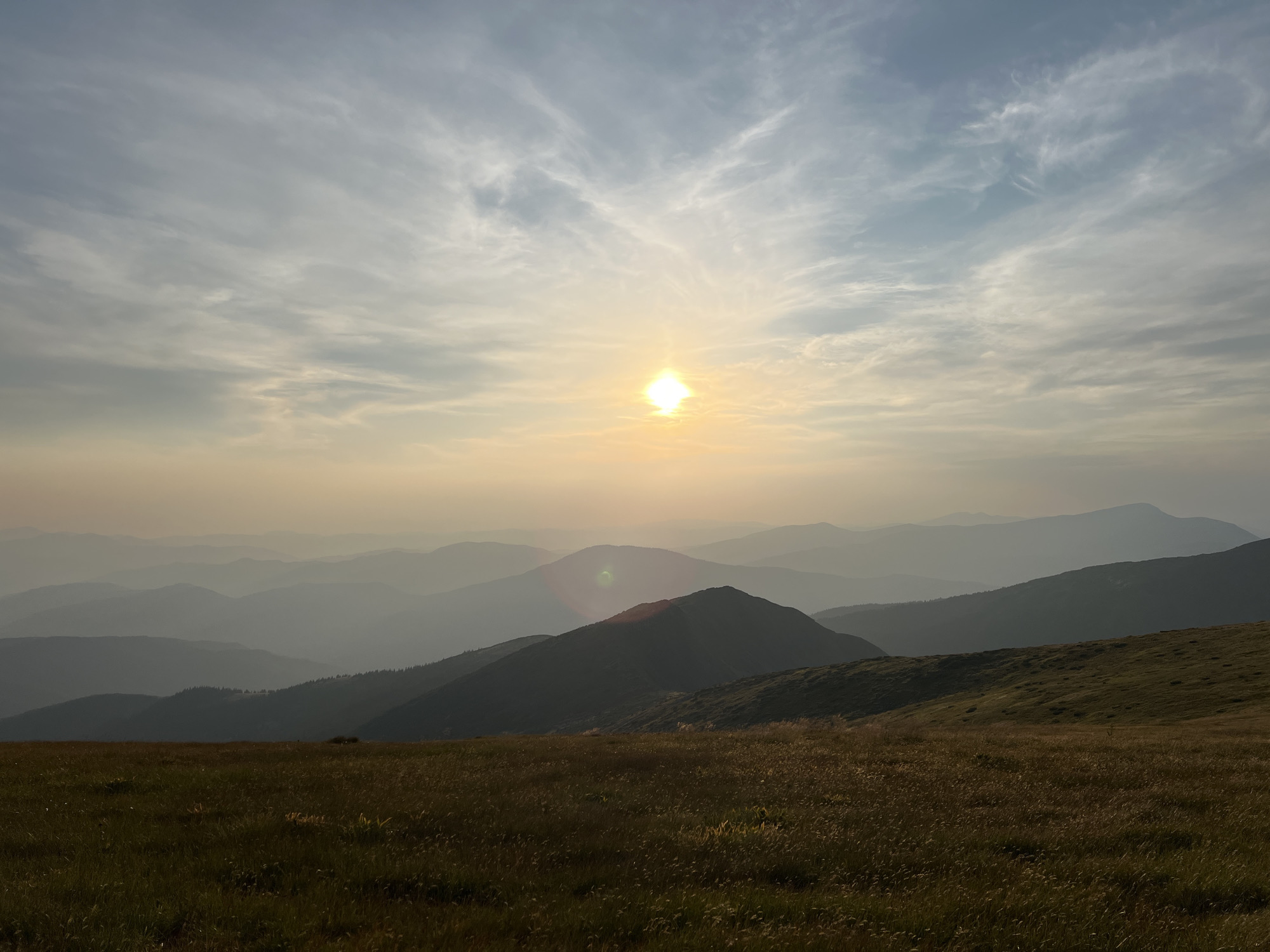 Sunset over the Carpathians from a hiking stop near Luhy
