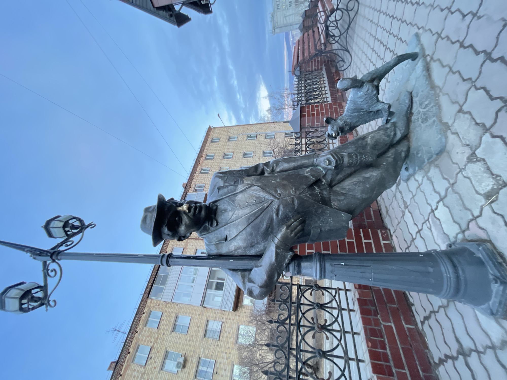 Street monuments documented in Krasnoyarsk including bronze statue, ornate clock