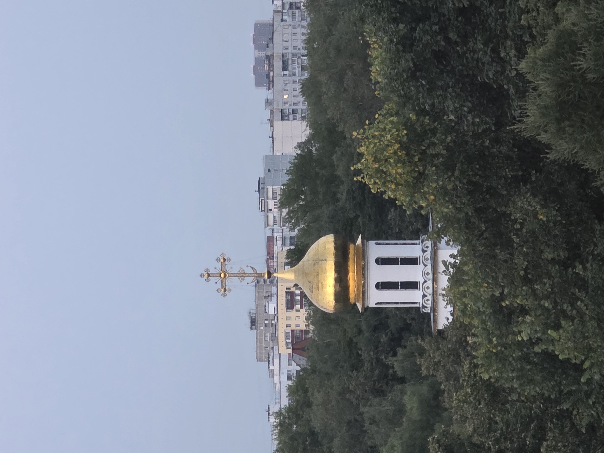 Moscow evening: church domes, city skyline, and a Platform 9¾ sign