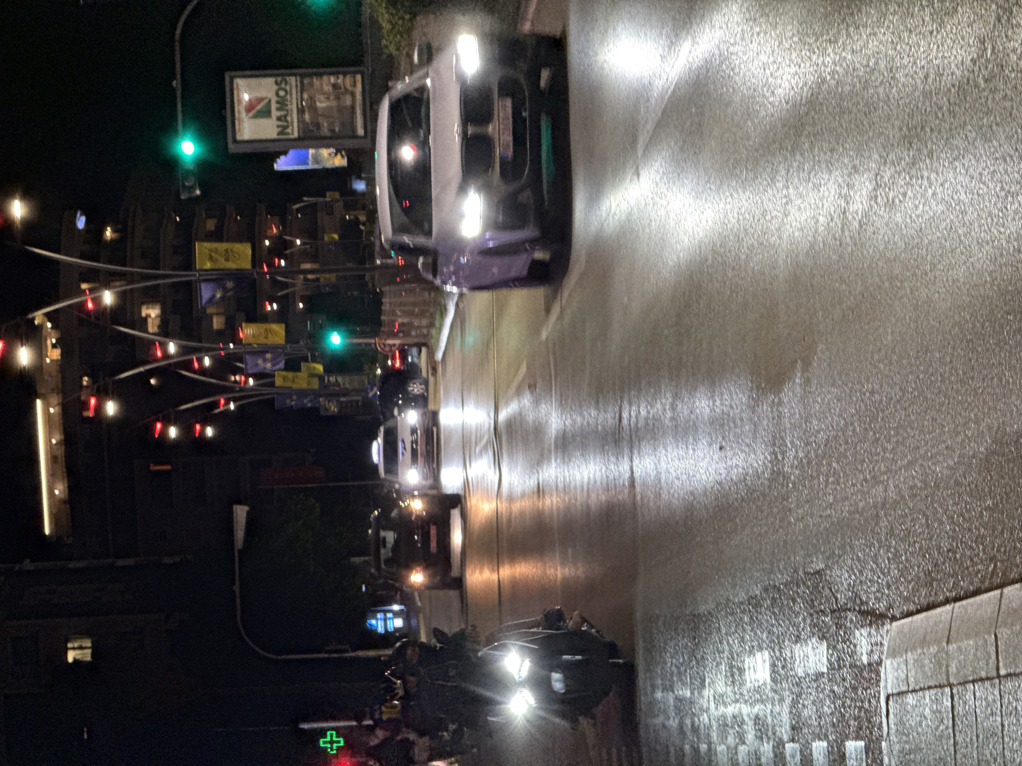 Evening street tour through wet Budva with garage stops
