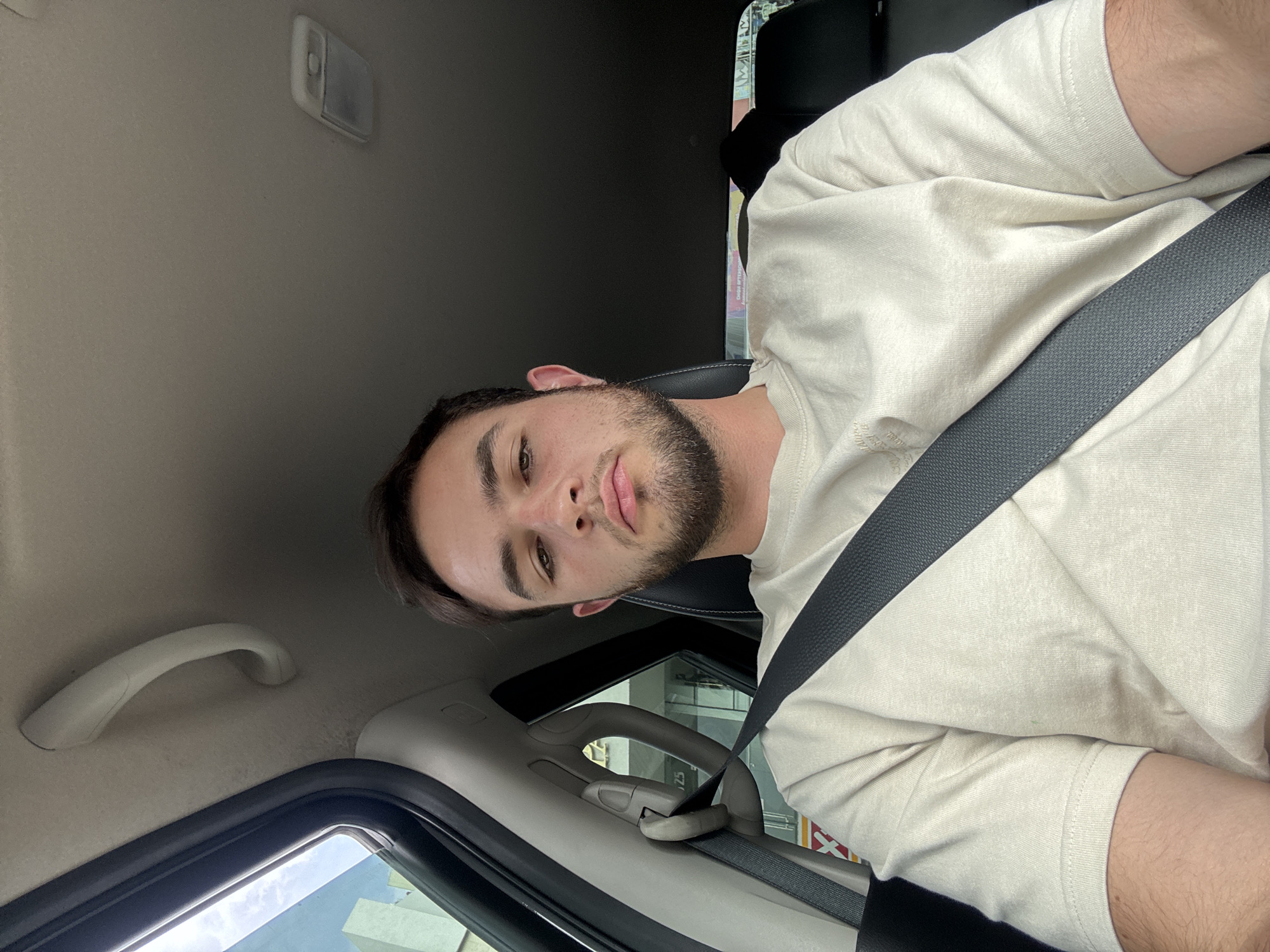 Young man photographed in vehicle in Tlaxcalancingo, Mexico