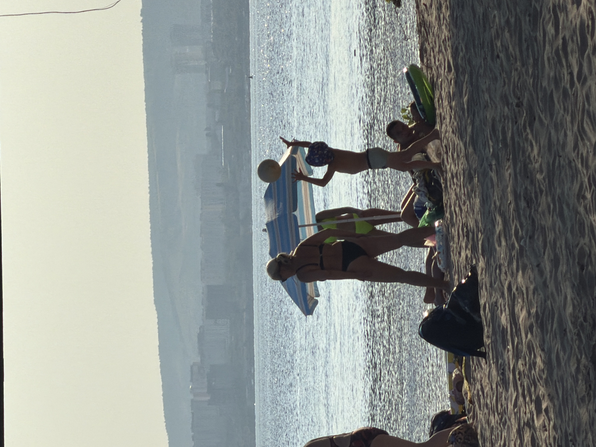 Lazy summer afternoon on the Volga beach in Engels