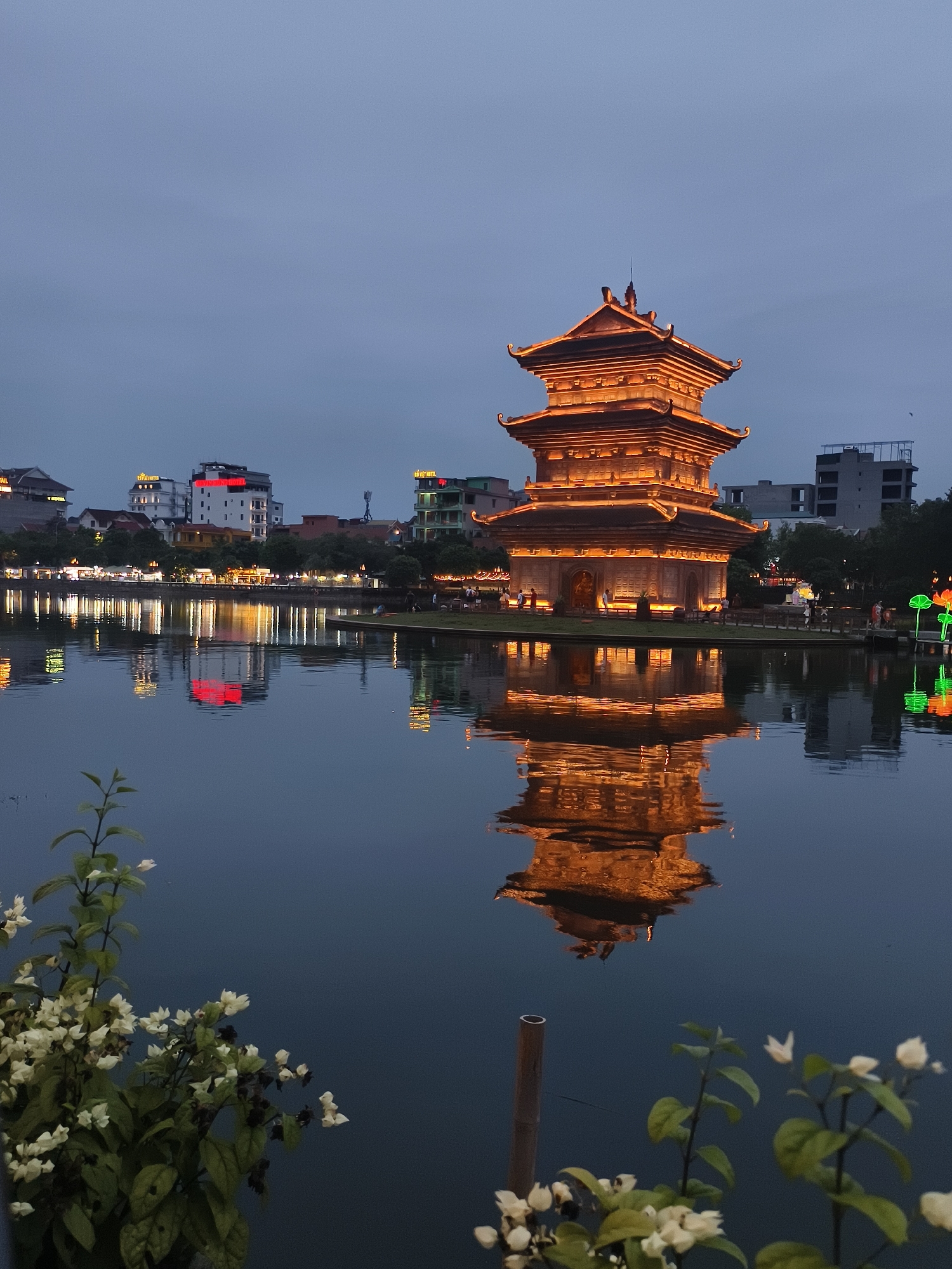 Evening pagoda lighting captured at Hoan Kiem Lake, Vietnam