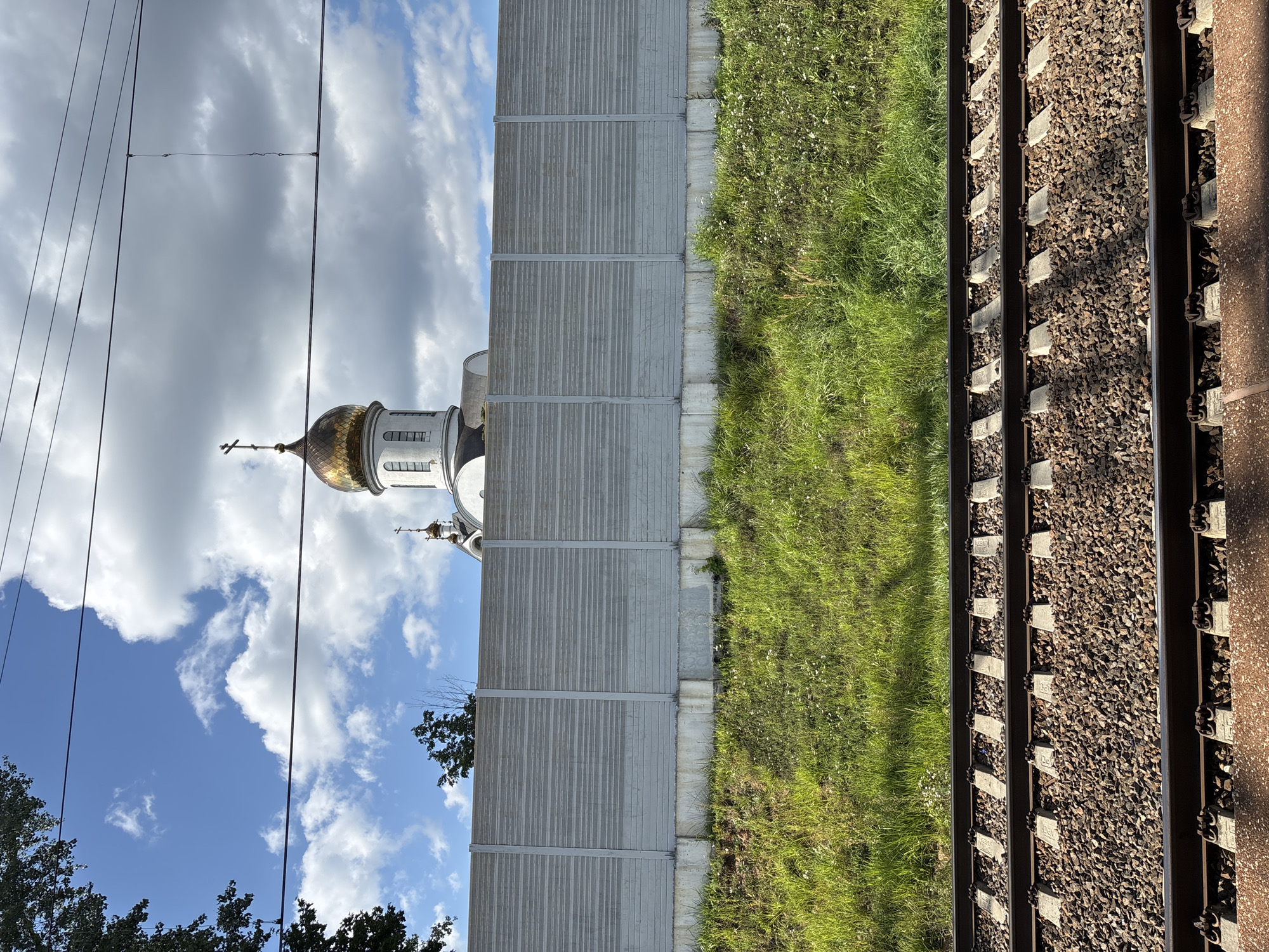 Rail lines, office buildings, and public art in a developing urban corridor